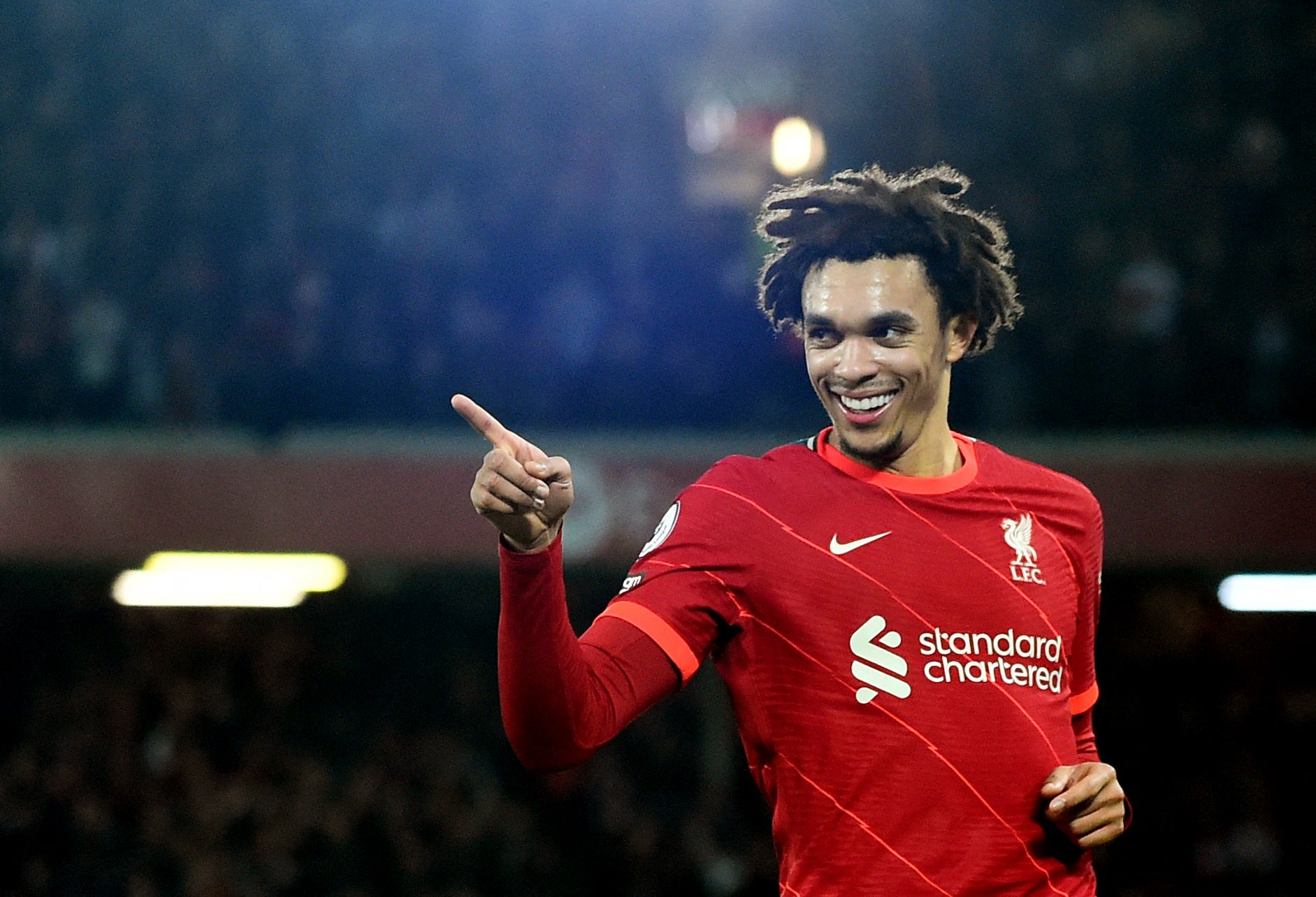 Trent Alexander-Arnold celebrates after scoring Liverpool’s third