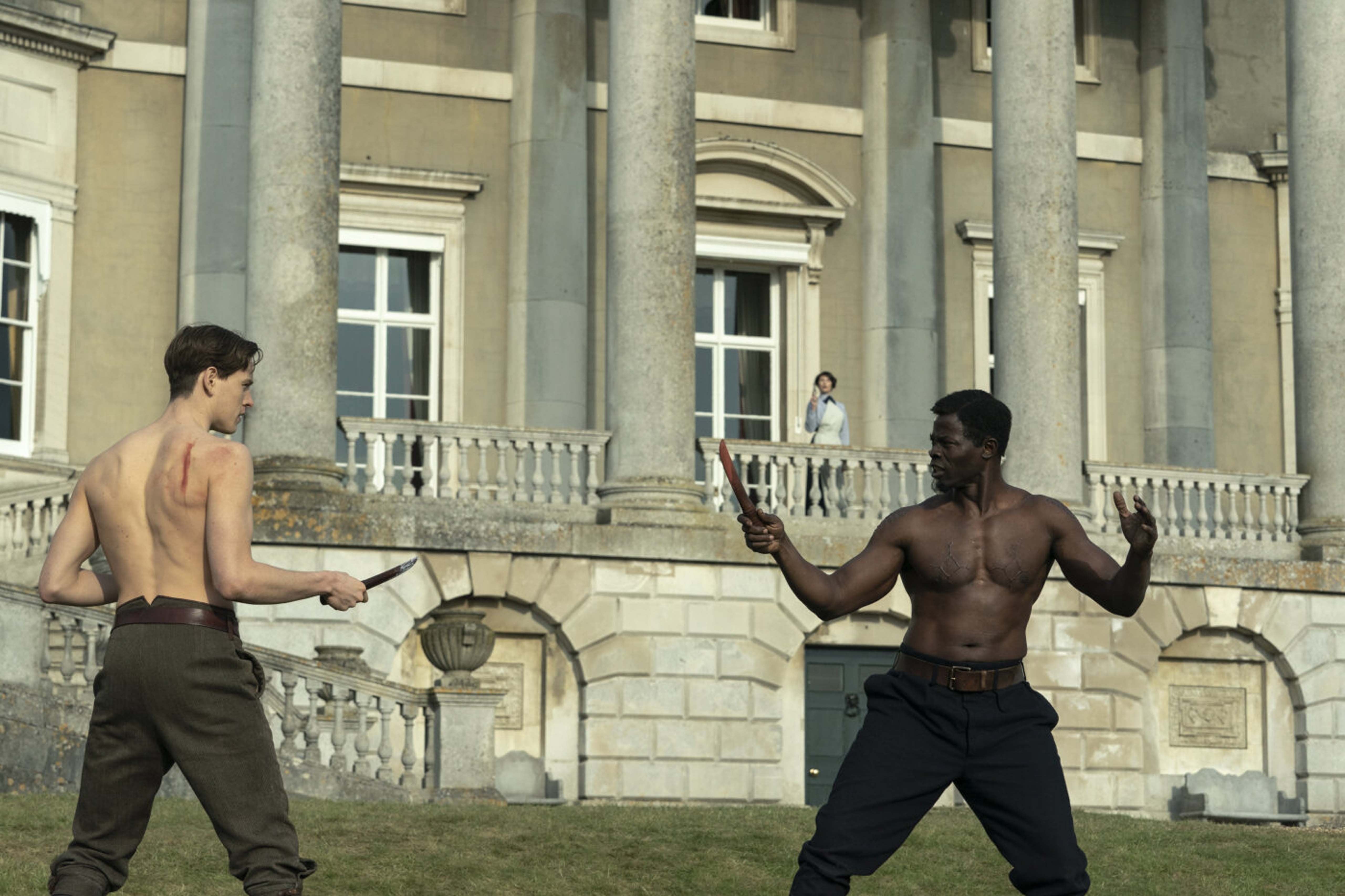 Harris Dickinson and Djimon Hounsou spar in ‘The King’s Man’