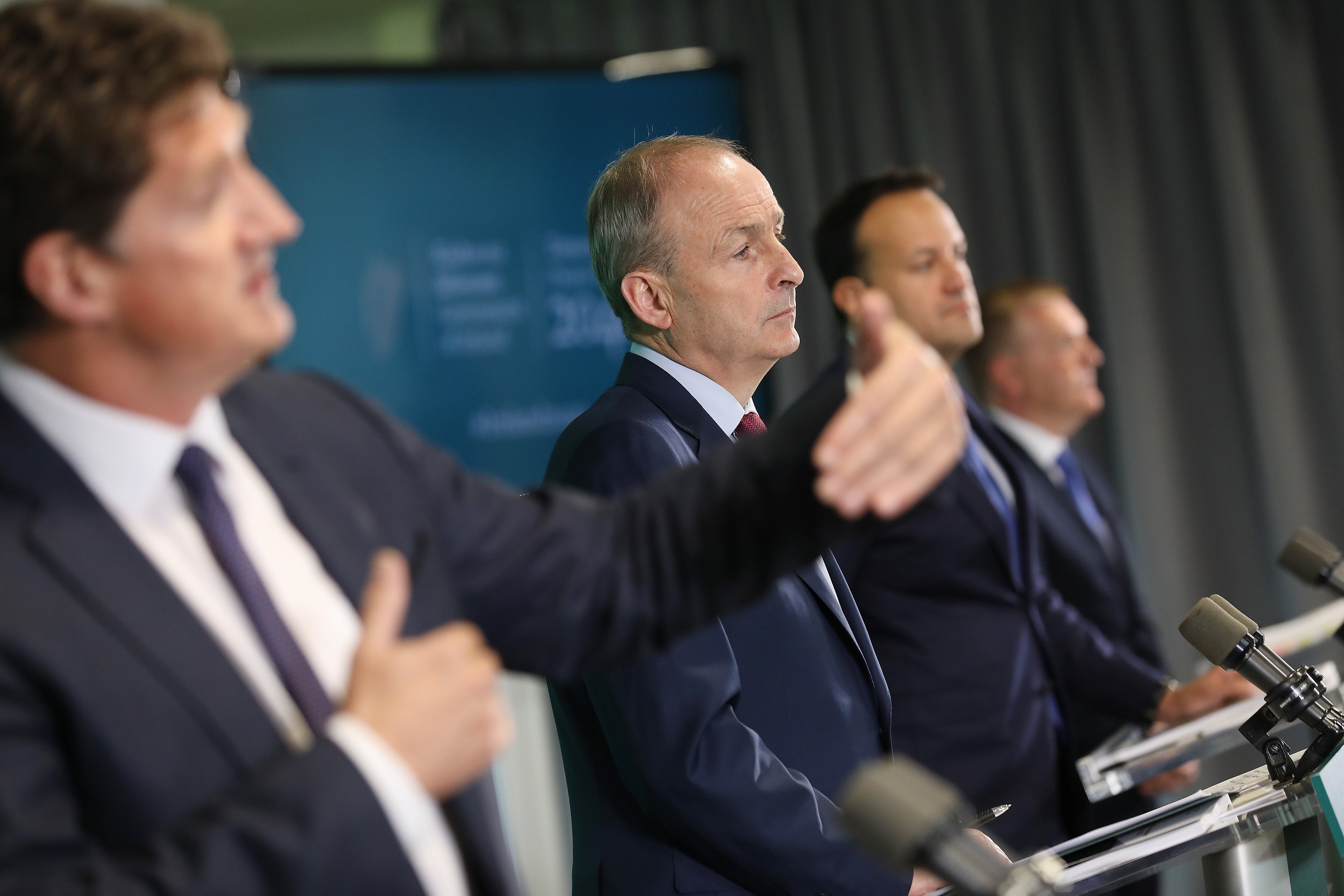 Undated handout photo issued by Julien Behal Photography of (left to right) Transport Minister Eamon Ryan, Taoiseach Micheal Martin, Tanaiste and Minister for Enterprise, Trade and Employment Leo Varadkar, and Minister for Public Expenditure, Michael McGrath, during an event to launch Ireland’s new national development plan at Pairc Ui Chaoimh in Cork. Picture date: Monday October 4, 2021.