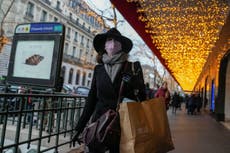 France urges vaccine uptake, bans New Year's concerts