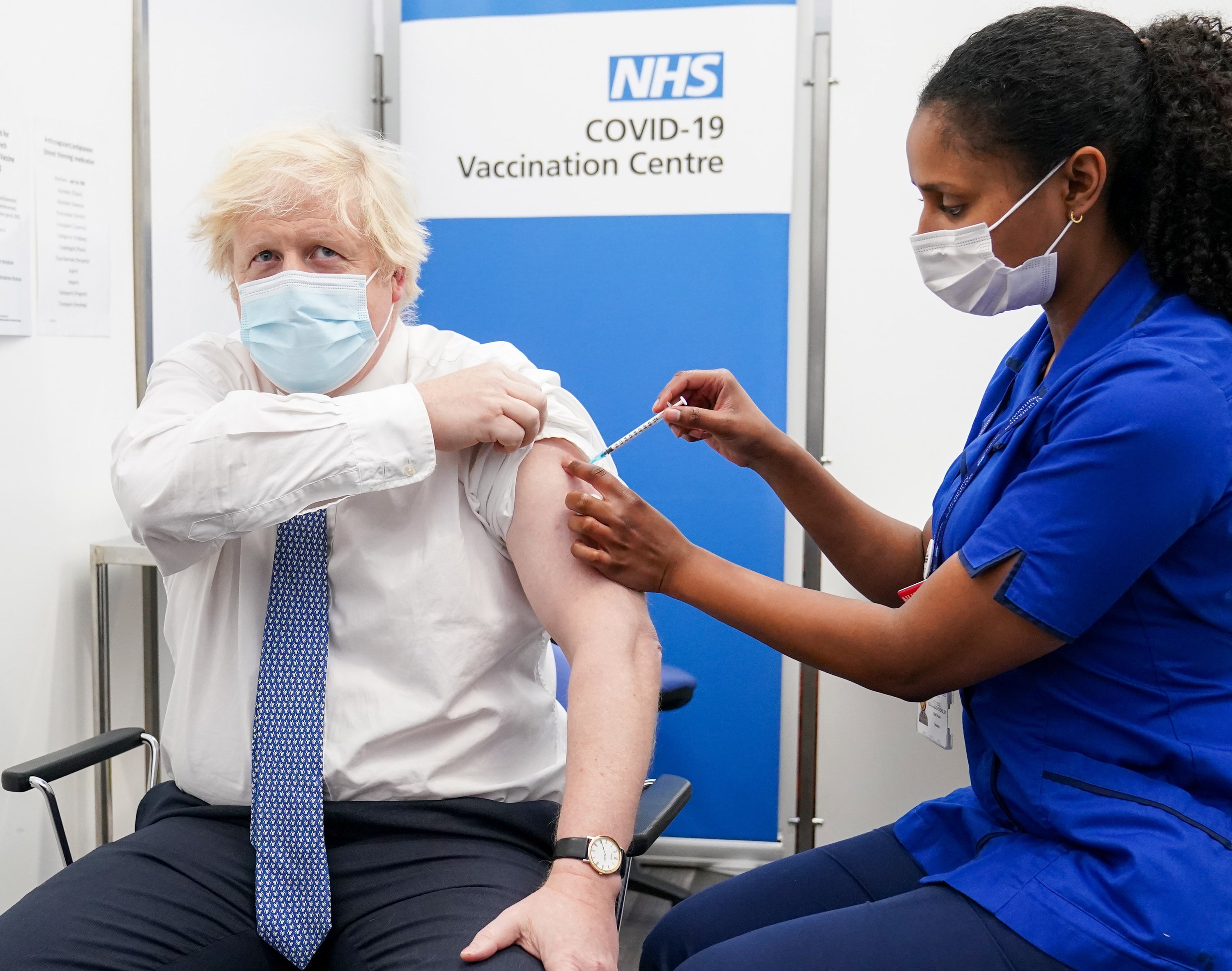 Prime Minister Boris Johnson receiving his booster jab (Paul Edwards/PA)