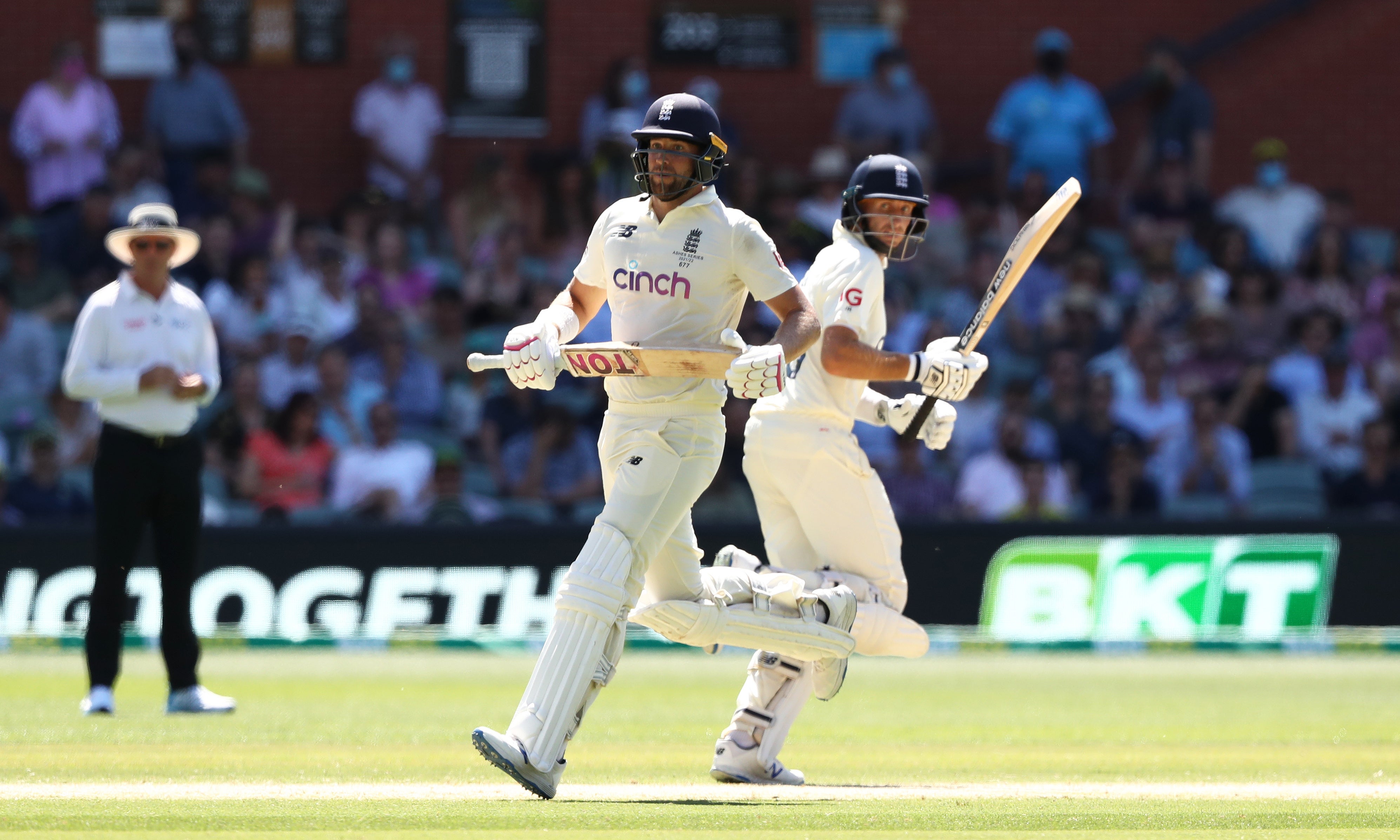 England’s Dawid Malan, left, and Joe Root, right, shared a 138-run partnership (Jason O’Brien/PA)