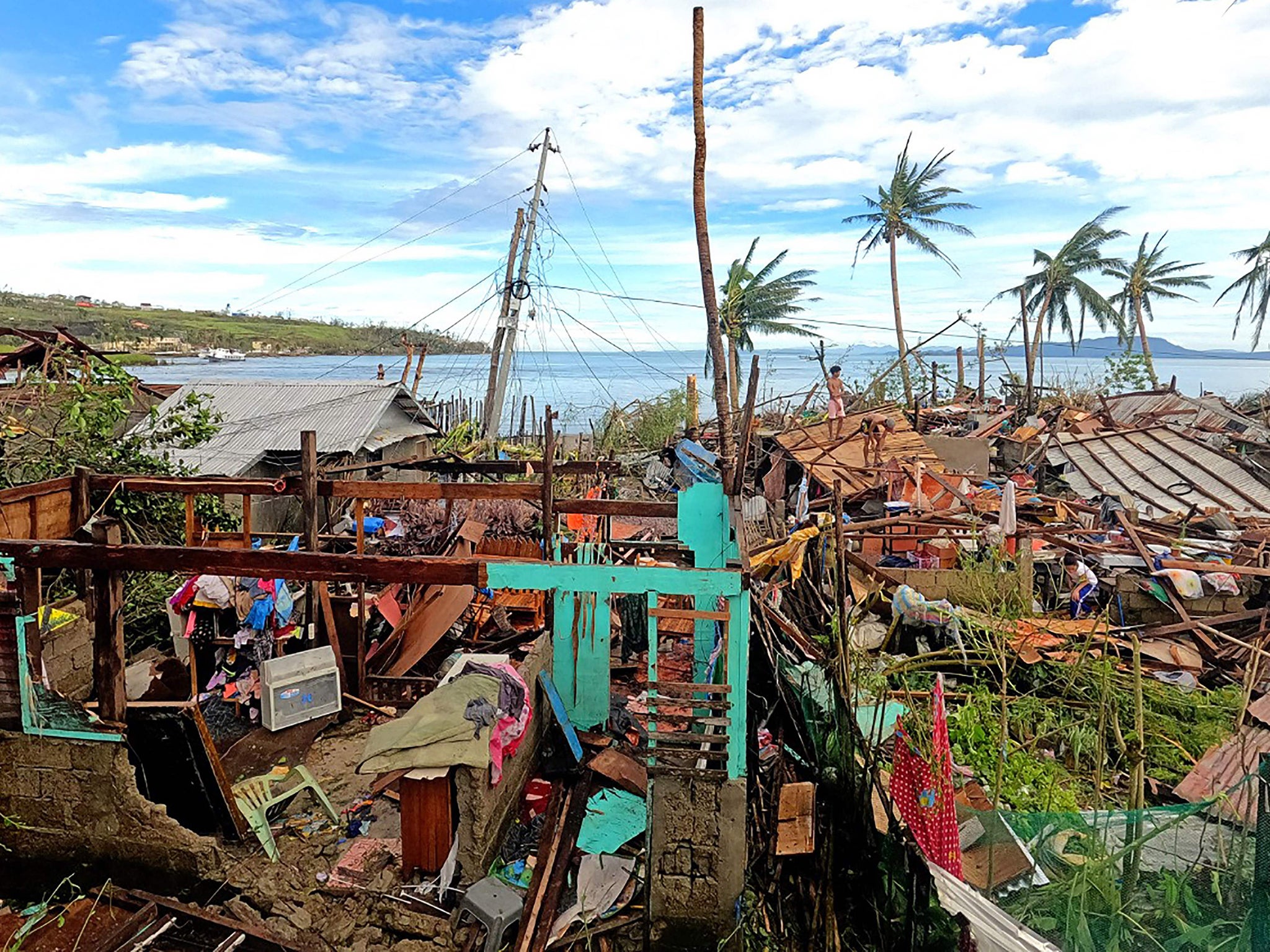 Coastal homes destroyed by typhoon Rai