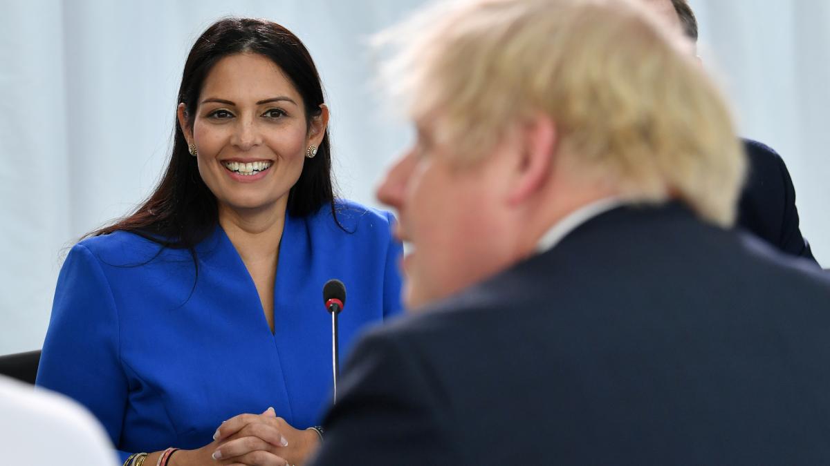 Priti Patel and Boris Johnson