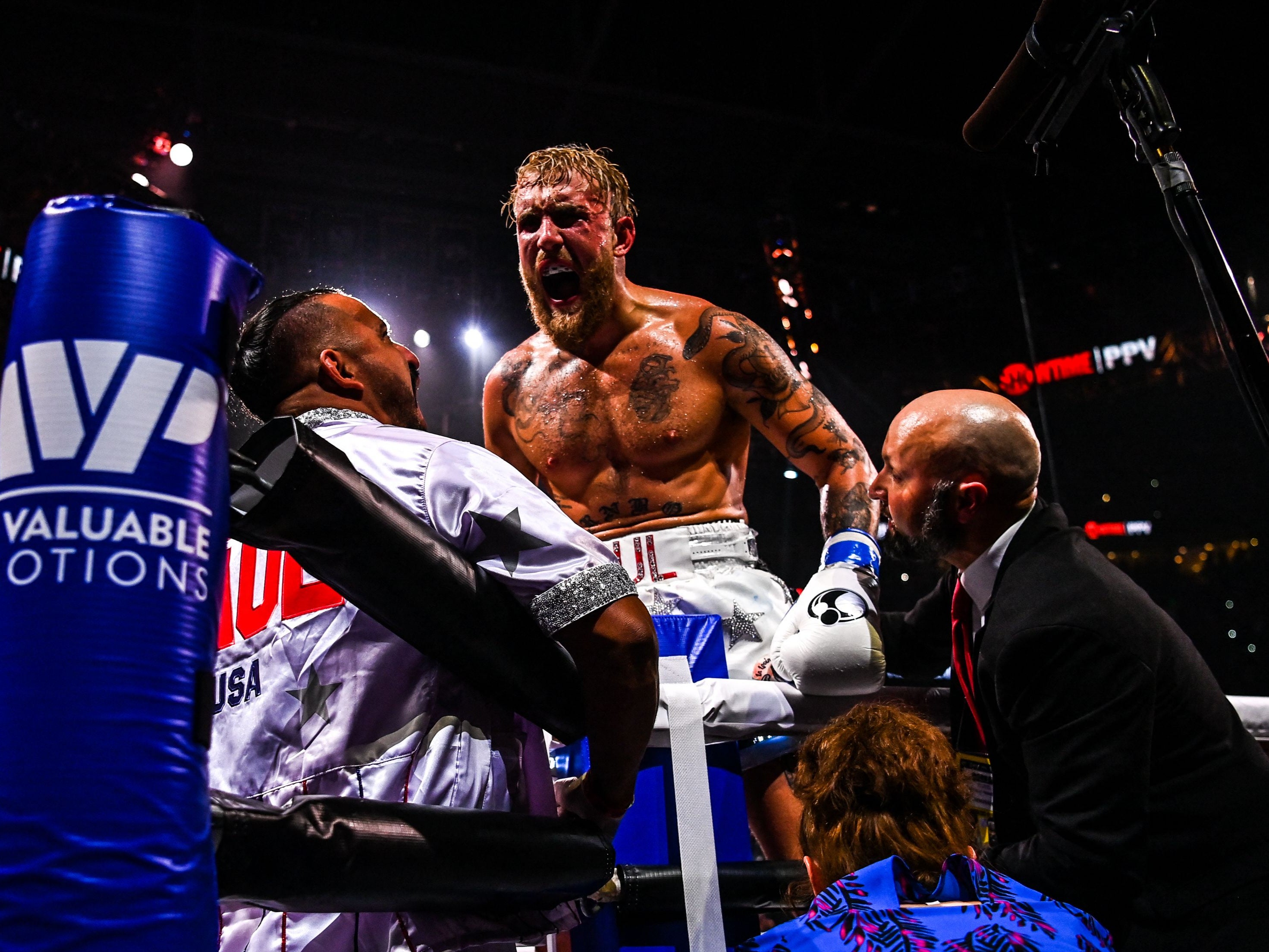 Jake Paul celebrates his second victory over Tyron Woodley