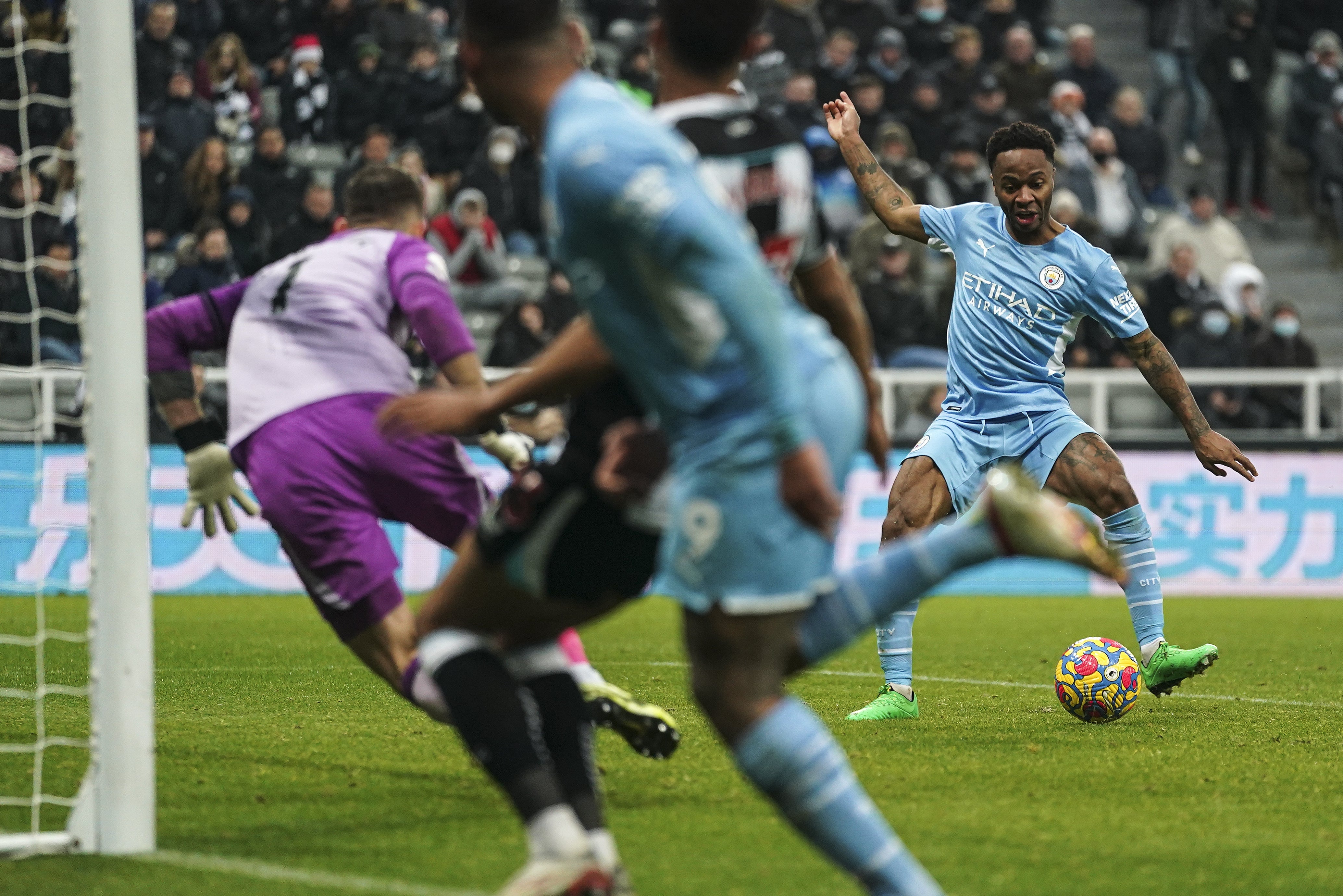 Raheem Sterling tucks away Manchester City’s fourth goal (Owen Humphreys/PA)