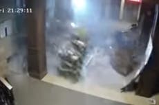 Surveillance video captures bank’s Christmas tree shaking before Kentucky tornado tore through building