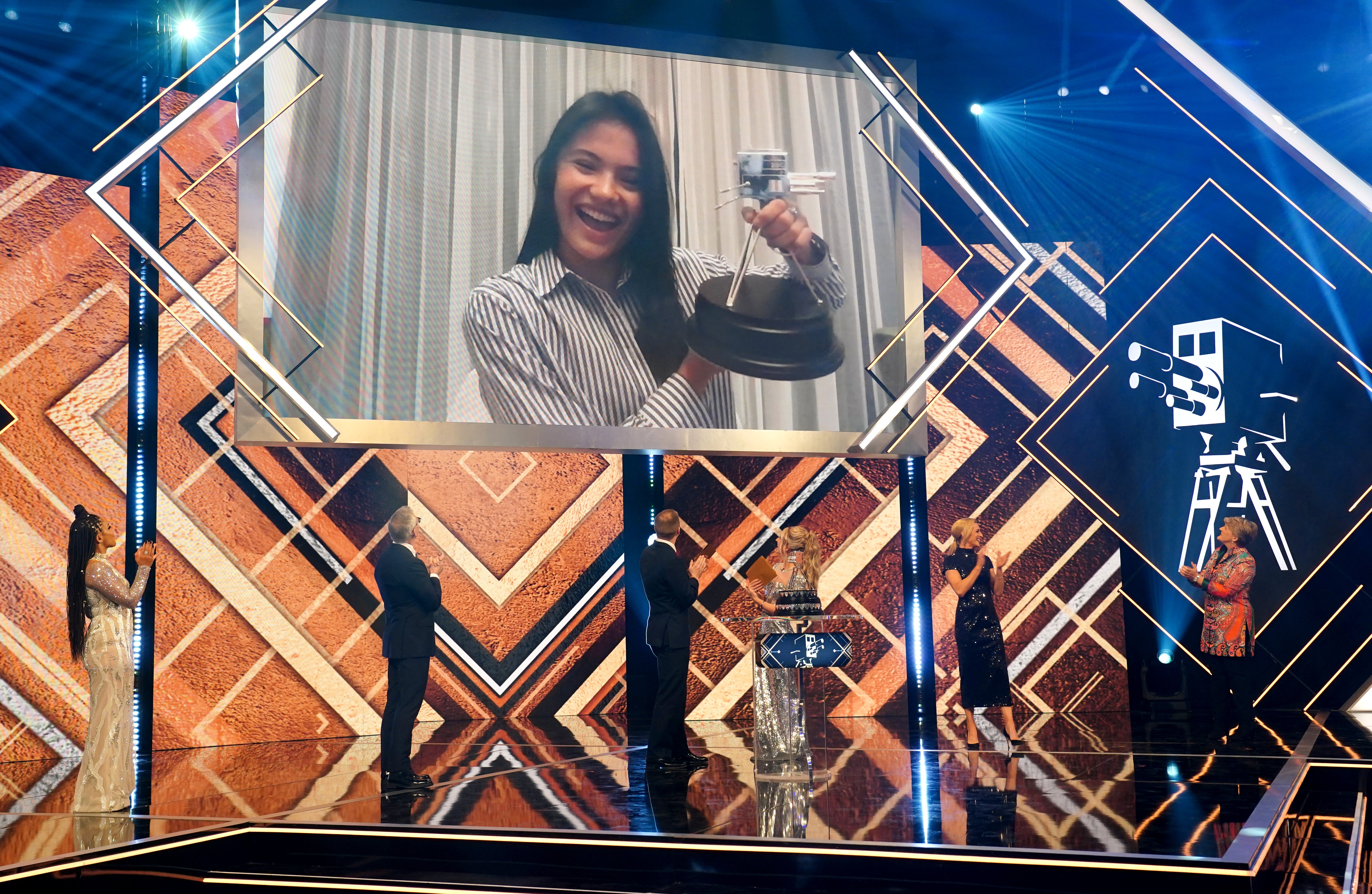 Emma Raducanu celebrates winning the BBC Sports Personality of the Year Award (David Davies/PA)