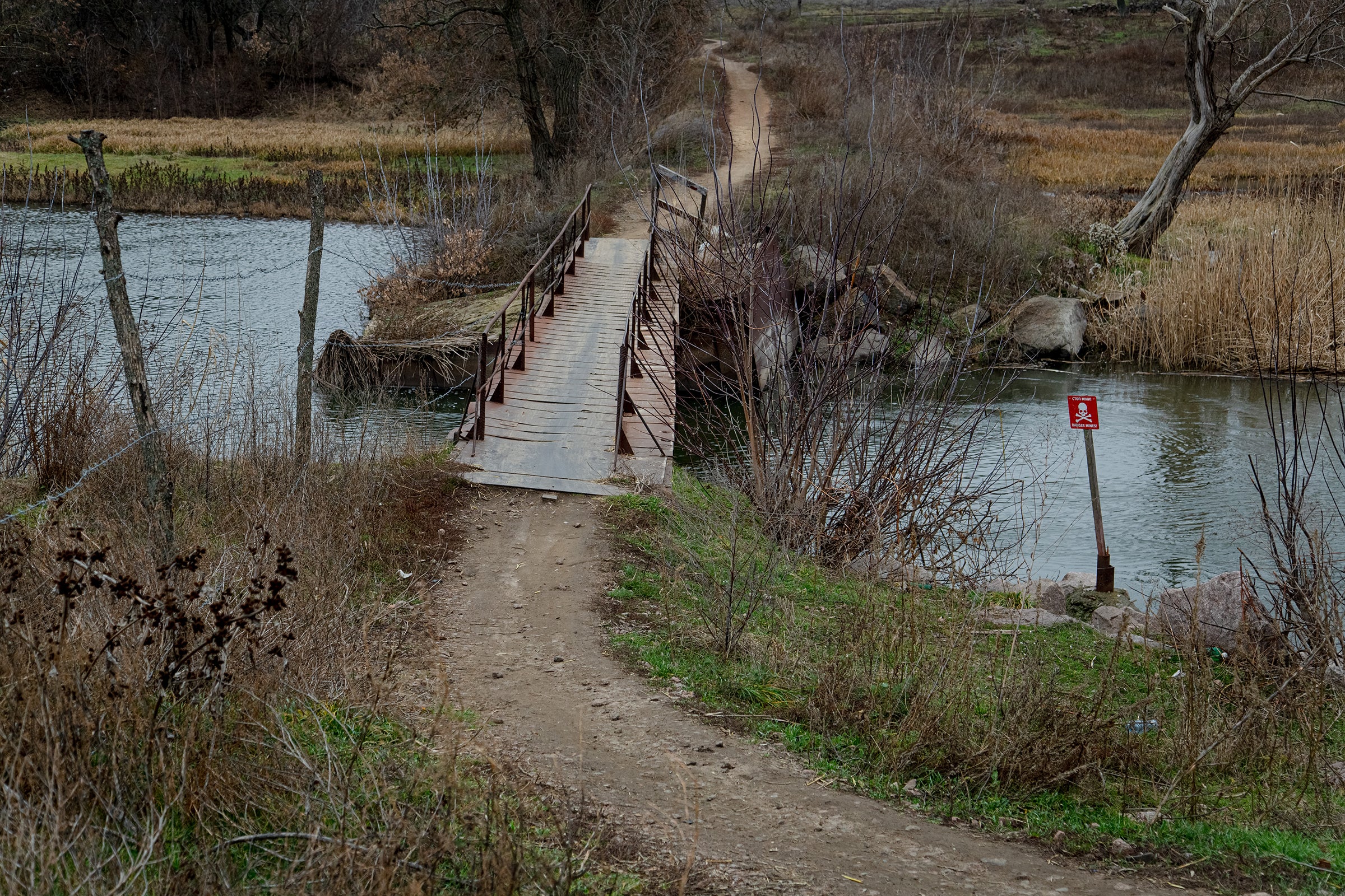 The bridge over the river to Staromarivka in the grey zone