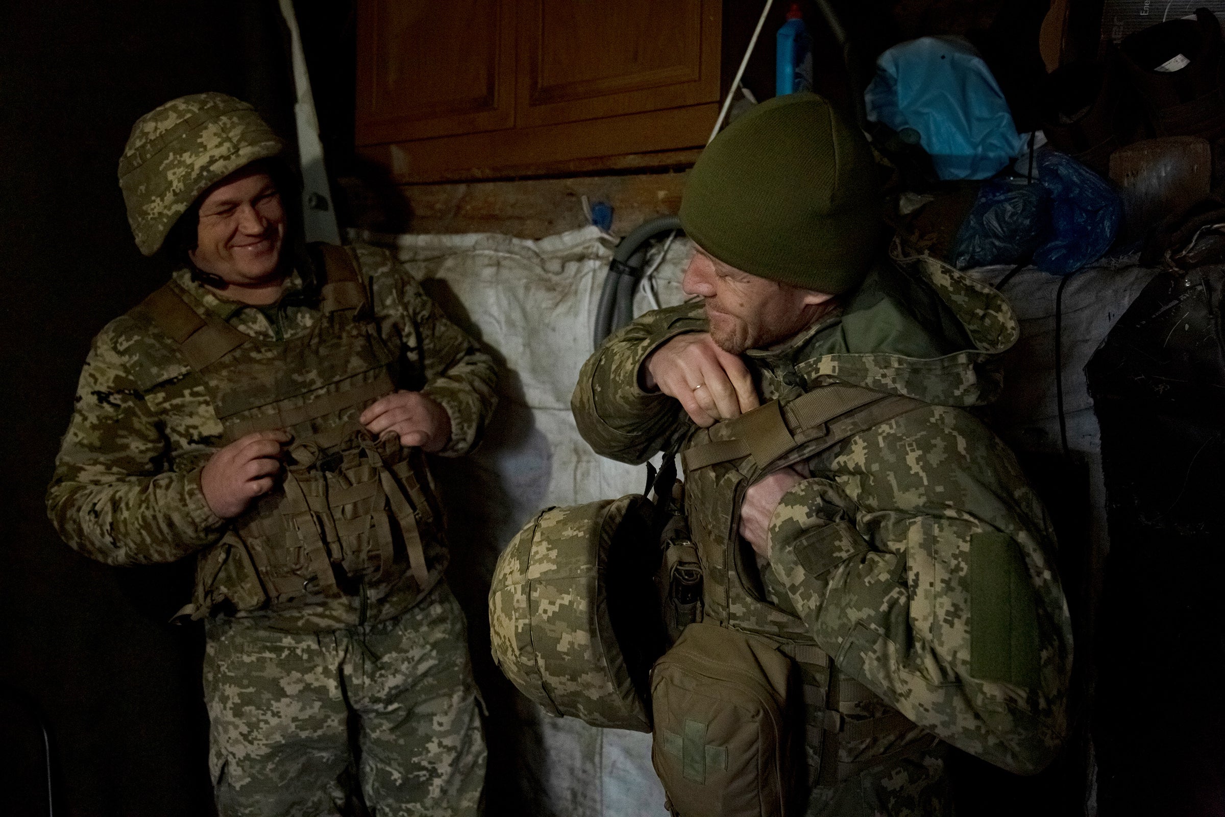 Ukrainian soldiers in a dugout shelter in Krasnohorivka