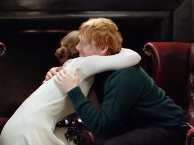 Emma Watson and Rupert Grint share a hug in the trailer for the ‘Harry Potter’ reunion