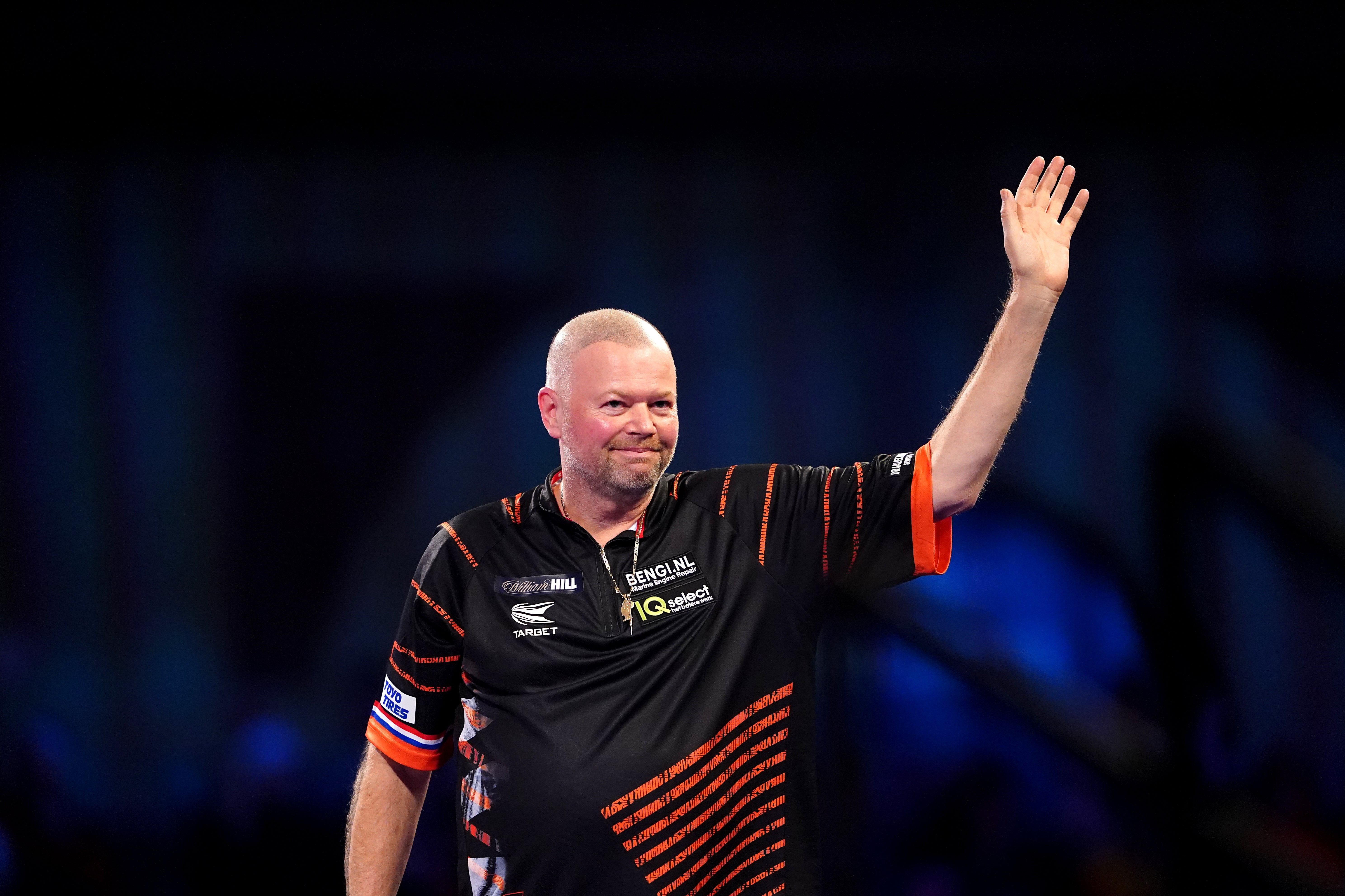 Raymond Van Barneveld, pictured, beat Lourence Ilagan 3-0 at Alexandra Palace (Zac Goodwin/PA)