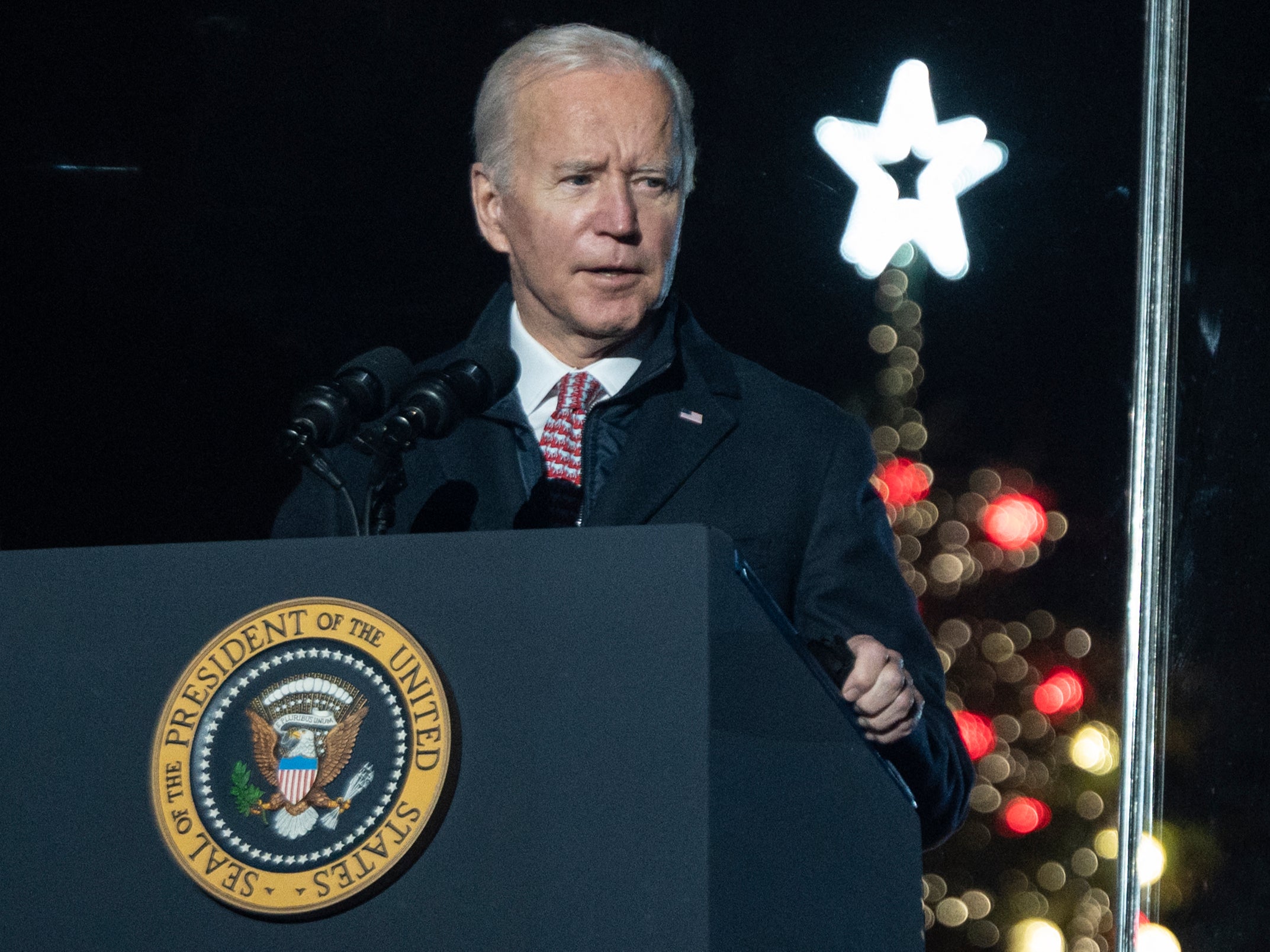 President Joe Biden speaks at the National Christmas Tree lighting ceremony held at the Ellipse near the White House, on 2 December 2, 2021 in Washington, DC