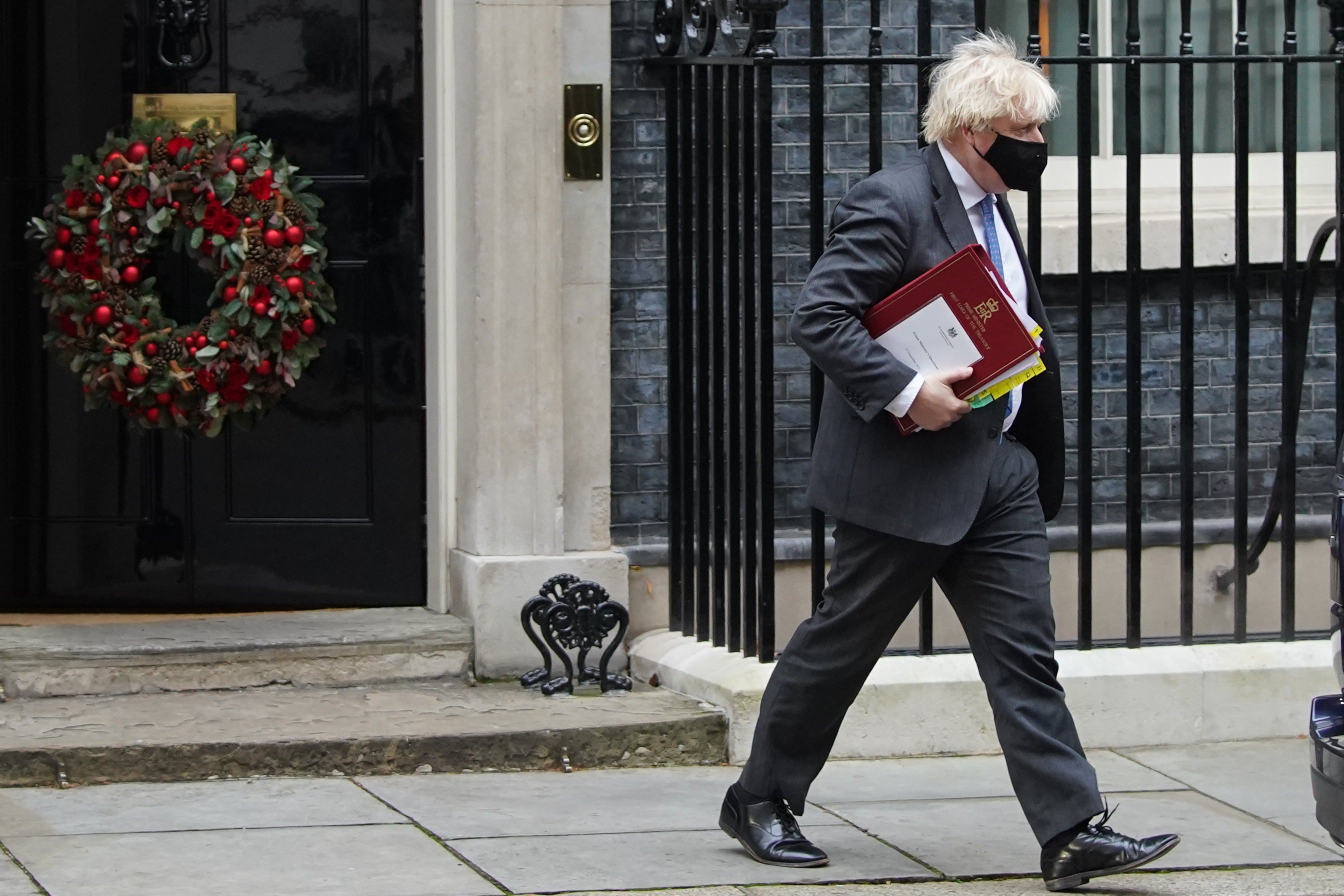 Prime Minister Boris Johnson leaves 10 Downing Street (PA)
