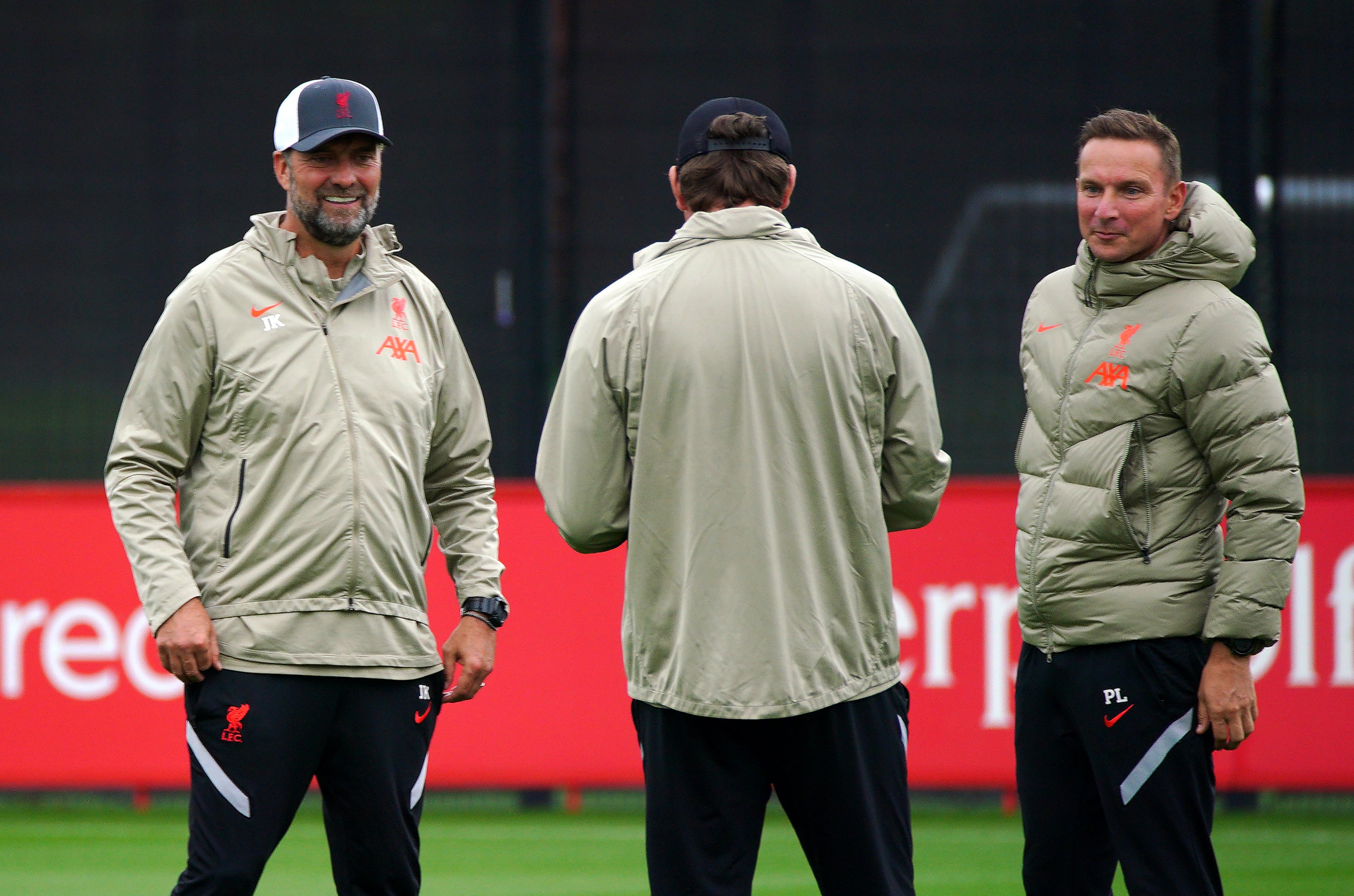 Lijnders (right) has been a key component of Jurgen Klopp’s (left) backroom staff but he plans to become a manager again in the future (Peter Byrne/PA)