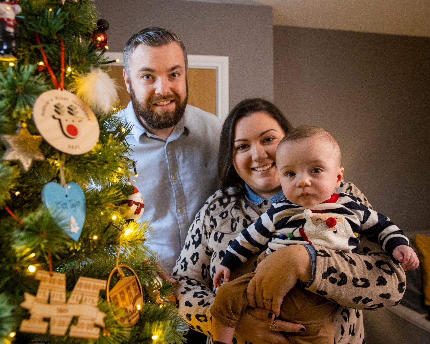 Martin and Gillian Johnston with their son Robert ‘Robbie’ Johnston at their home in Ballyclare, Northern Ireland (Liam McBurney/PA)