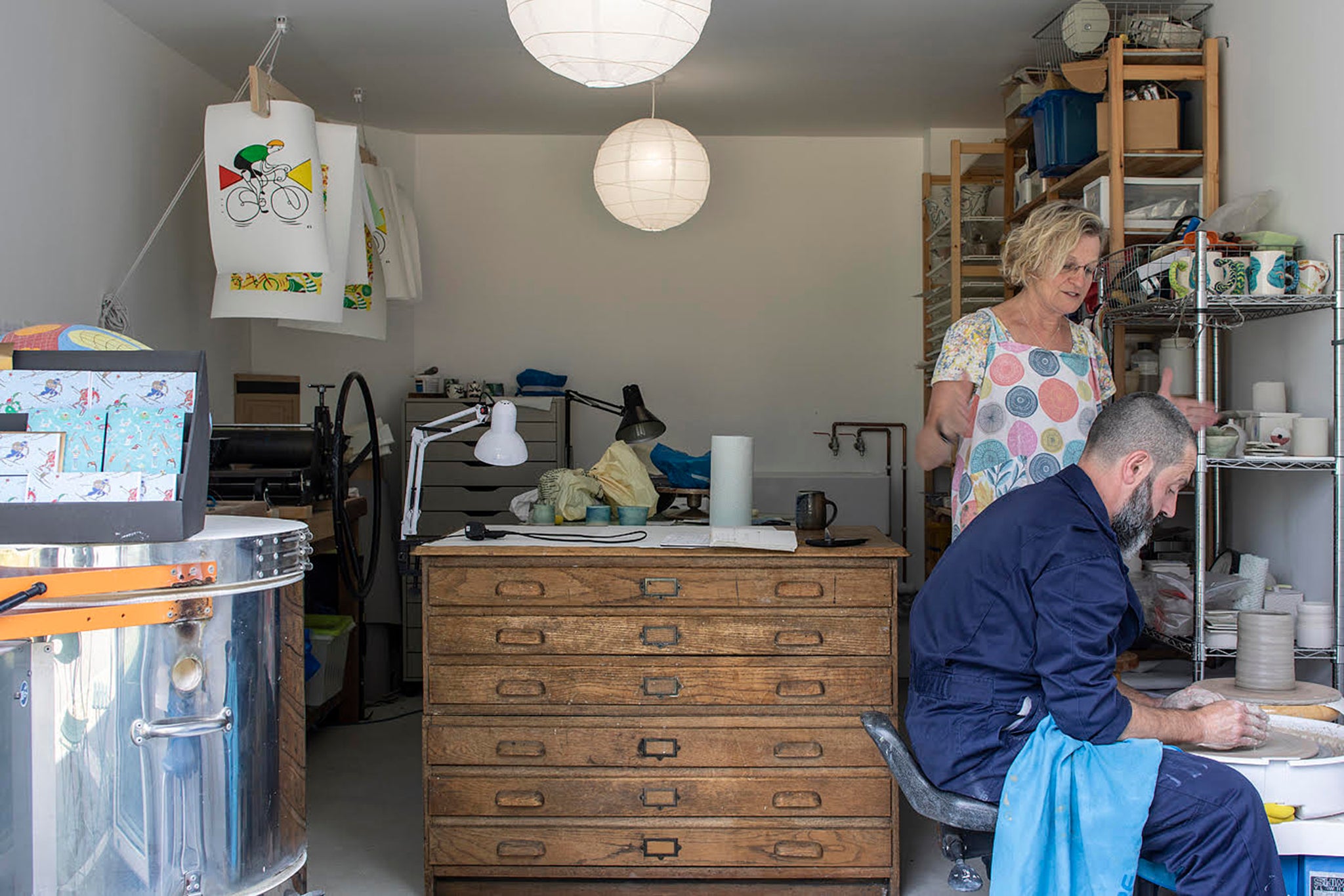 Cohousing resident Emma Sutherland with one of her pottery students