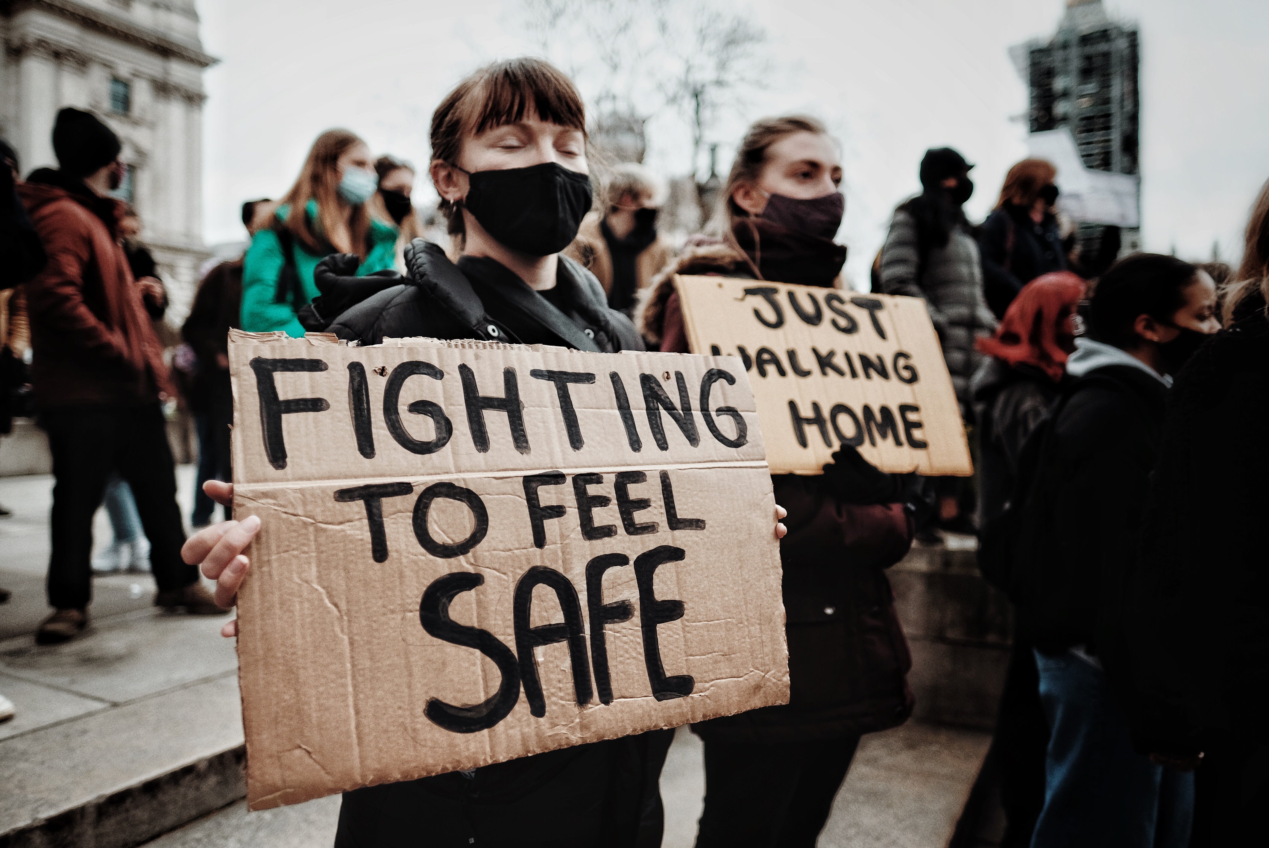 Protesters marching aganst misogyny and male violence in London