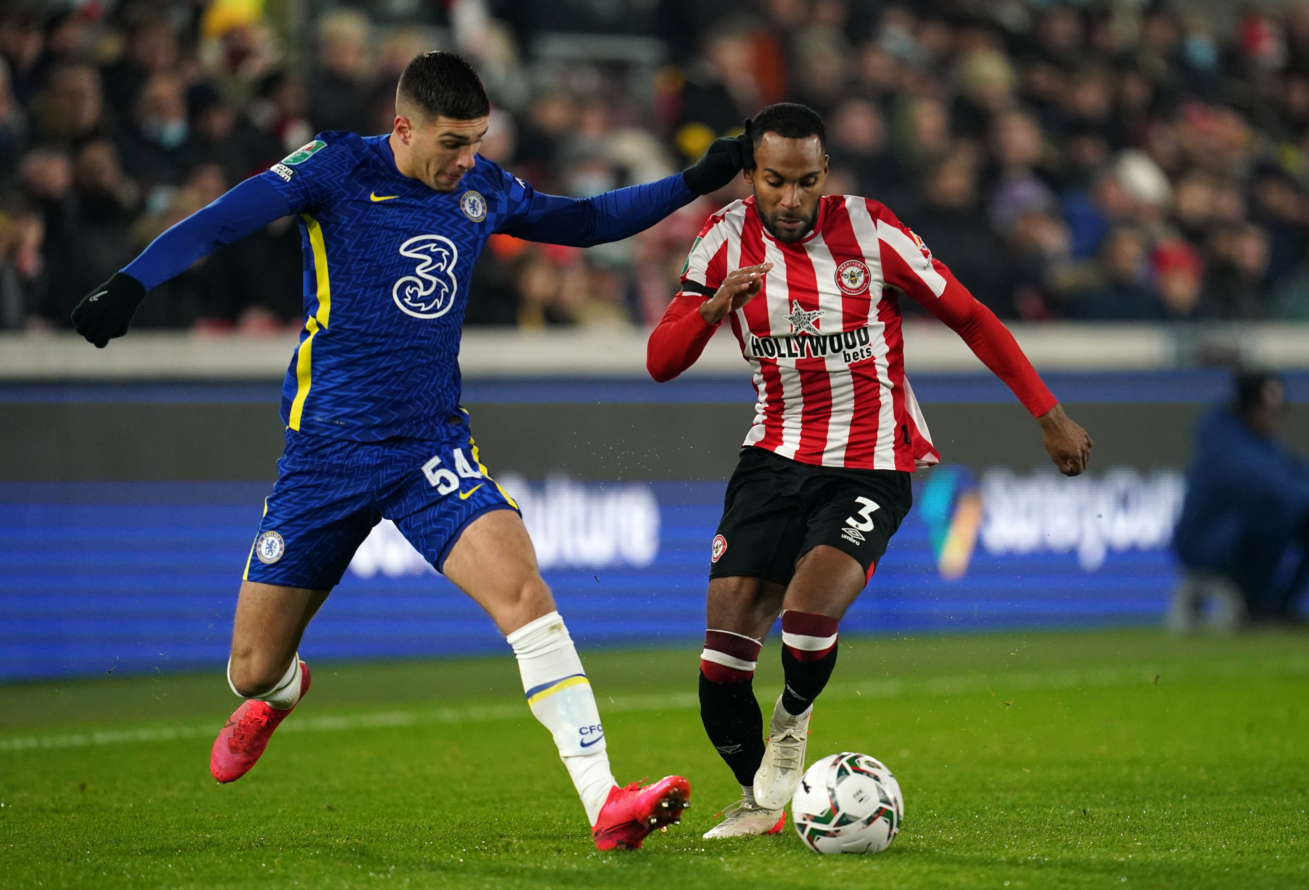 Xavier Simons, left, made his debut for Chelsea