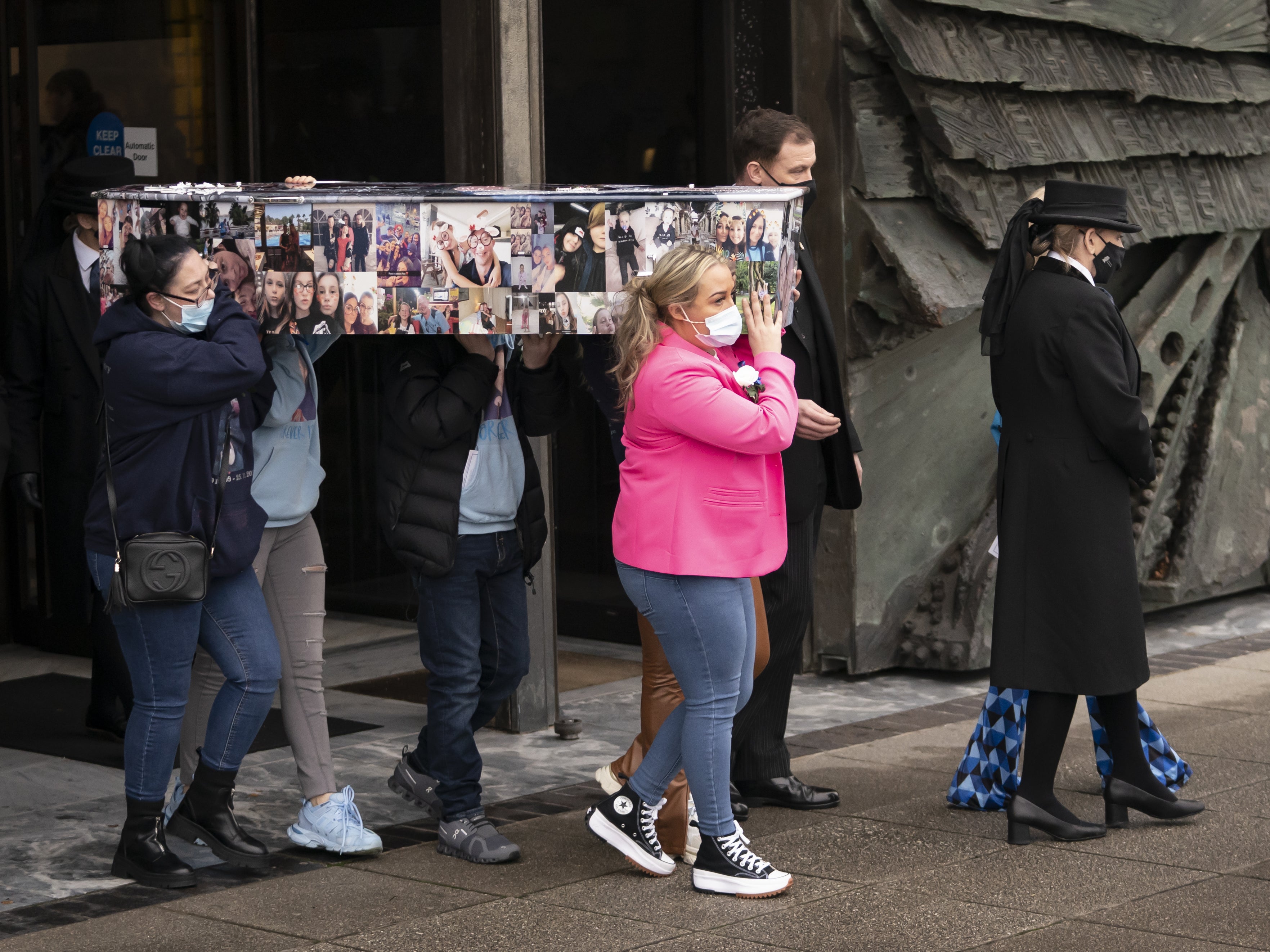 The coffin of Ava White is carried out of Liverpool Metropolitan Cathedral following her funeral service (Danny Lawson/PA)