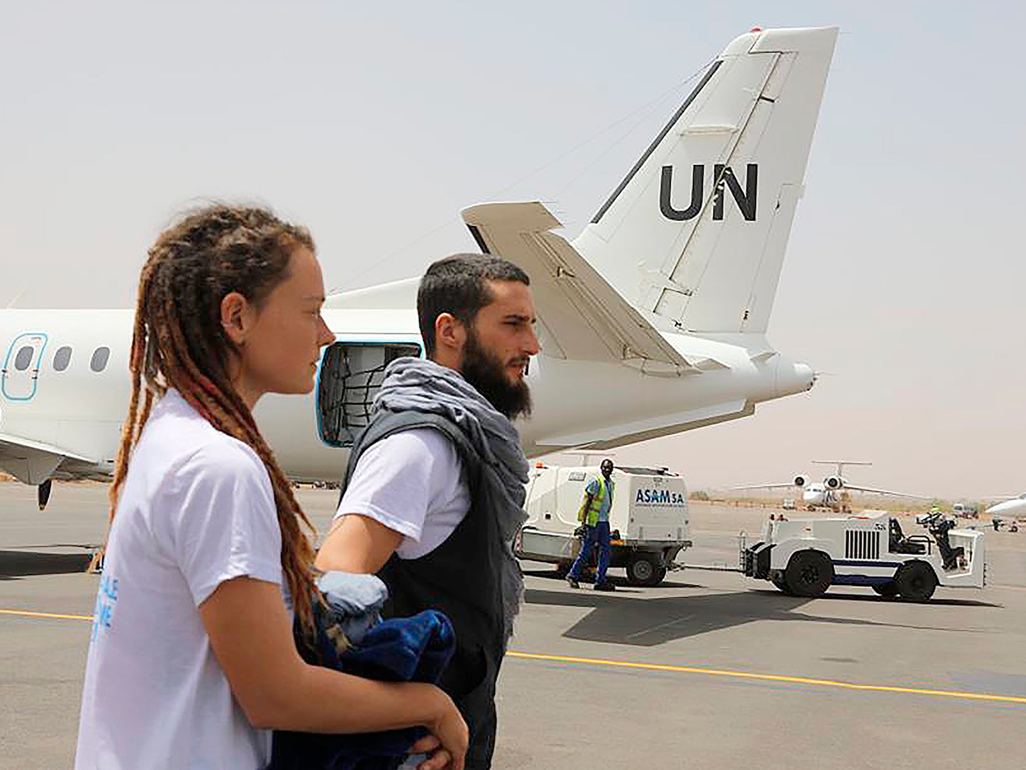 Ms Blais and Luca Tacchetto, her travelling companion and fellow captive, pictured after their daring overnight escape from the mujahideen camp