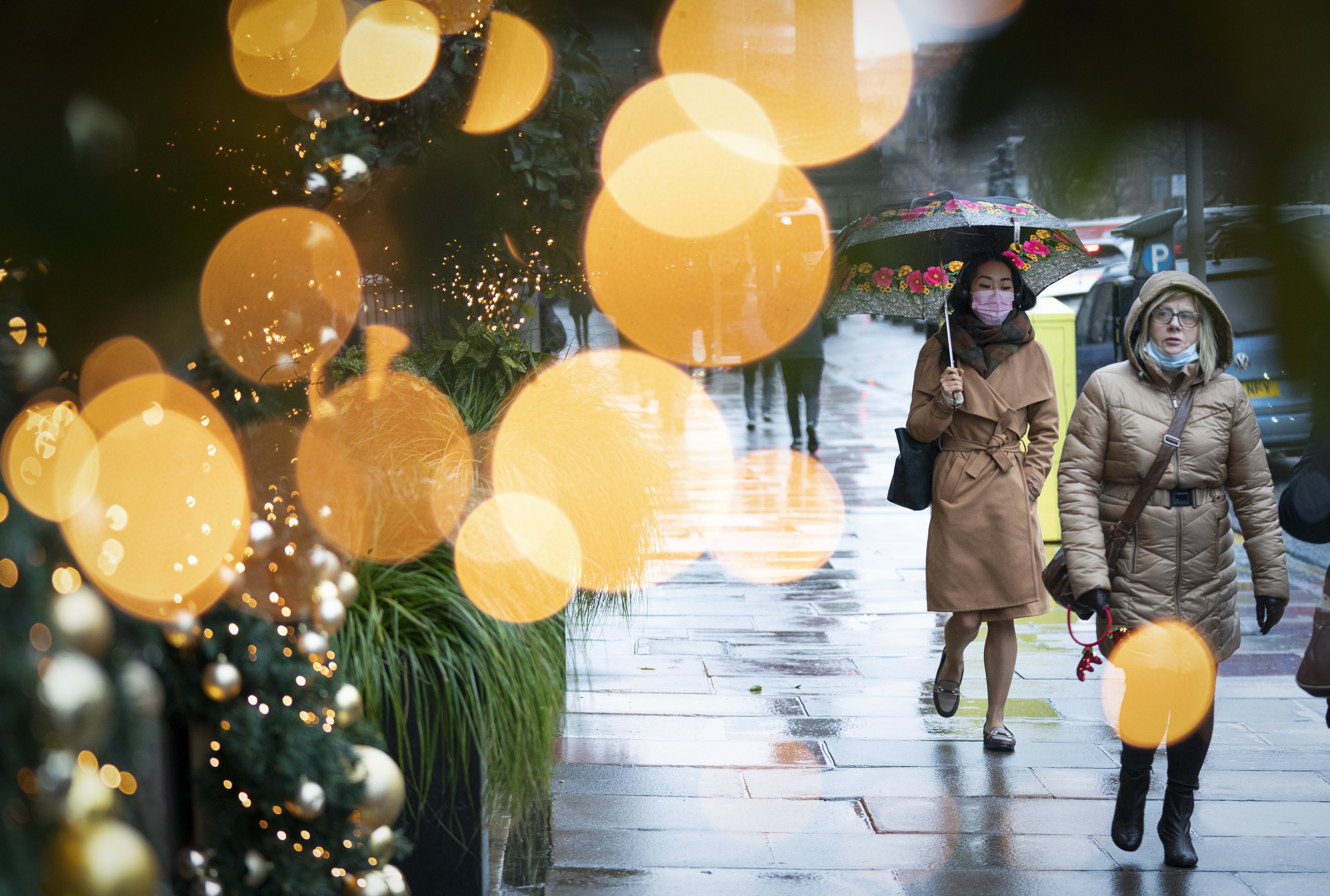 Christmas shoppers in Edinburgh city centre (Jane Barlow/PA)