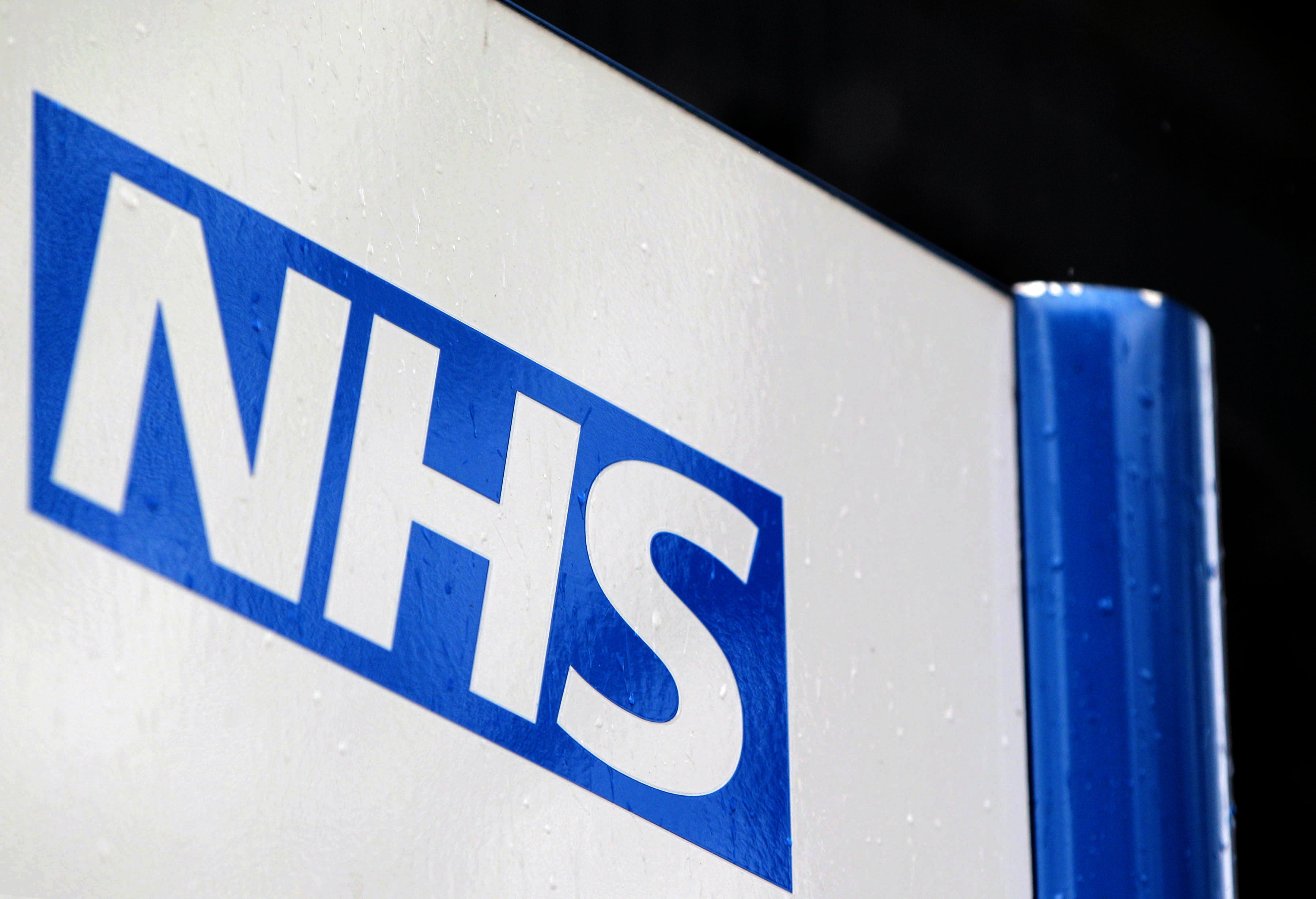 An NHS sign (Yui Mok/PA)