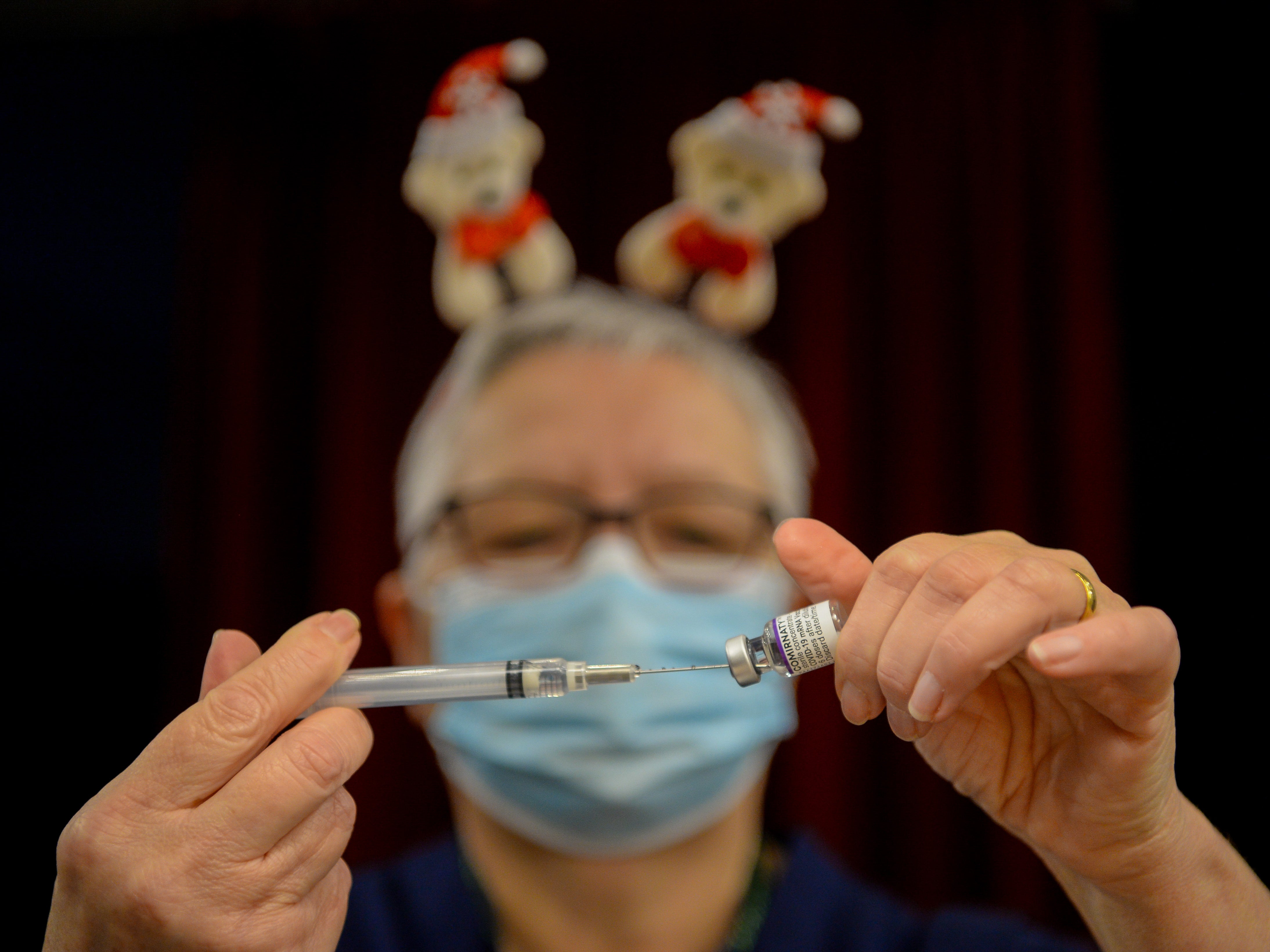 A Covid vaccine is prepared at a walk-in centre in Dorset