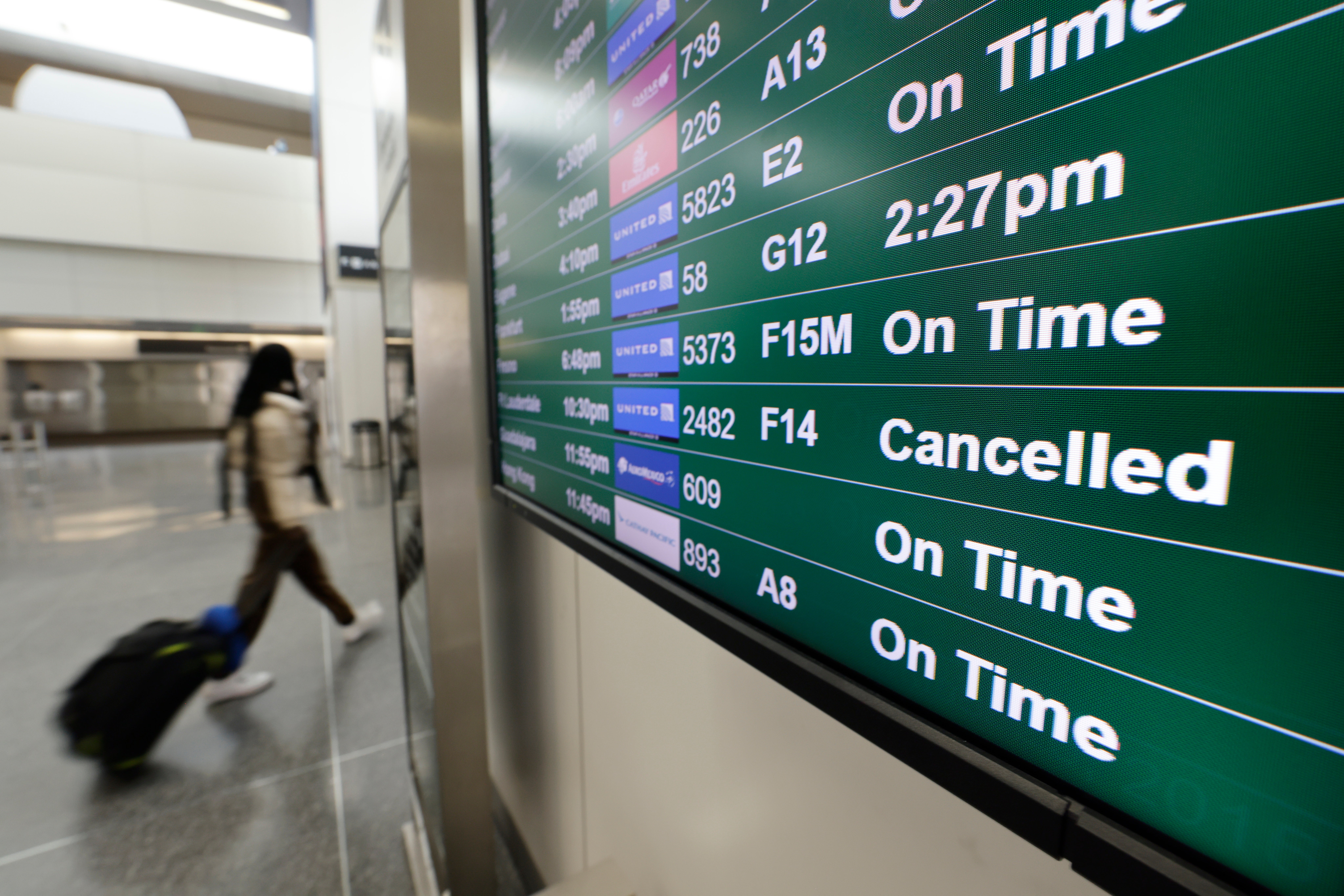 The flight information display system at the San Francisco International Airport on Christmas Eve in San Francisco, California, USA, 24 December 2021