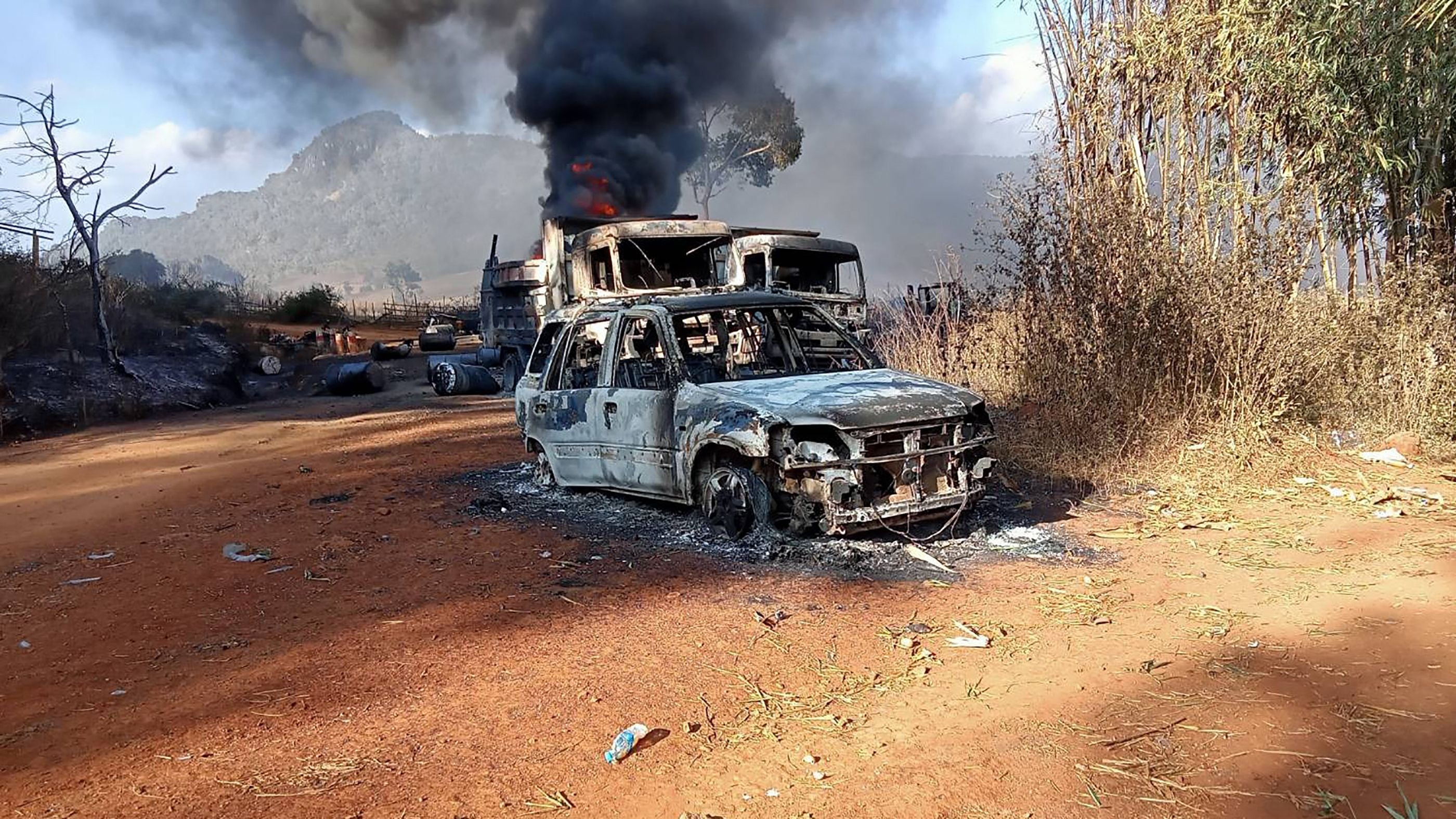 Destroyed vehicles in Hpruso town in Kayah state, where the bodies were found