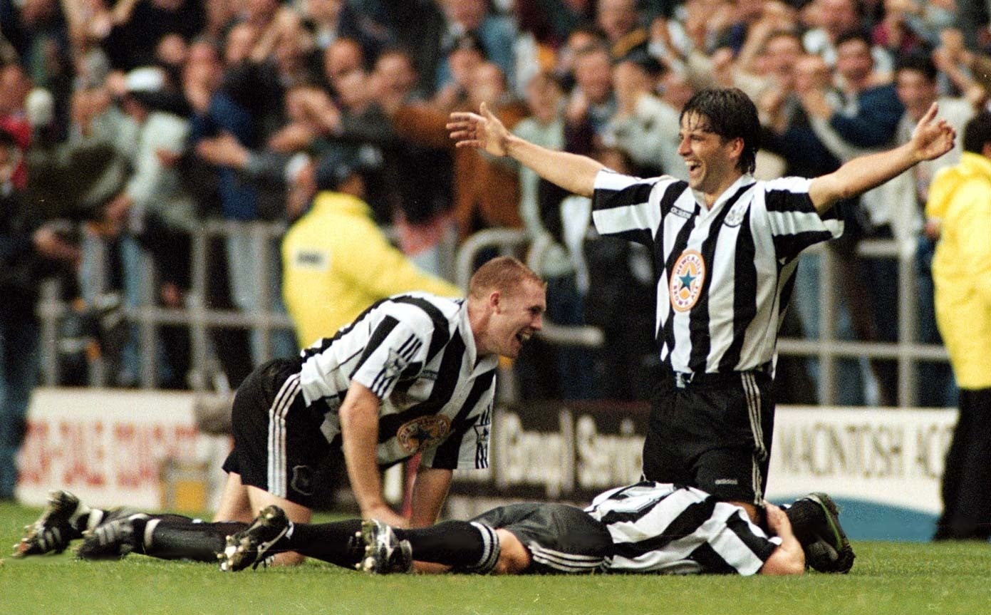 Philippe Albert (right) celebrates scoring Newcastle’s final goal in a 5-0 win over Manchester United (Owen Humphreys/PA)