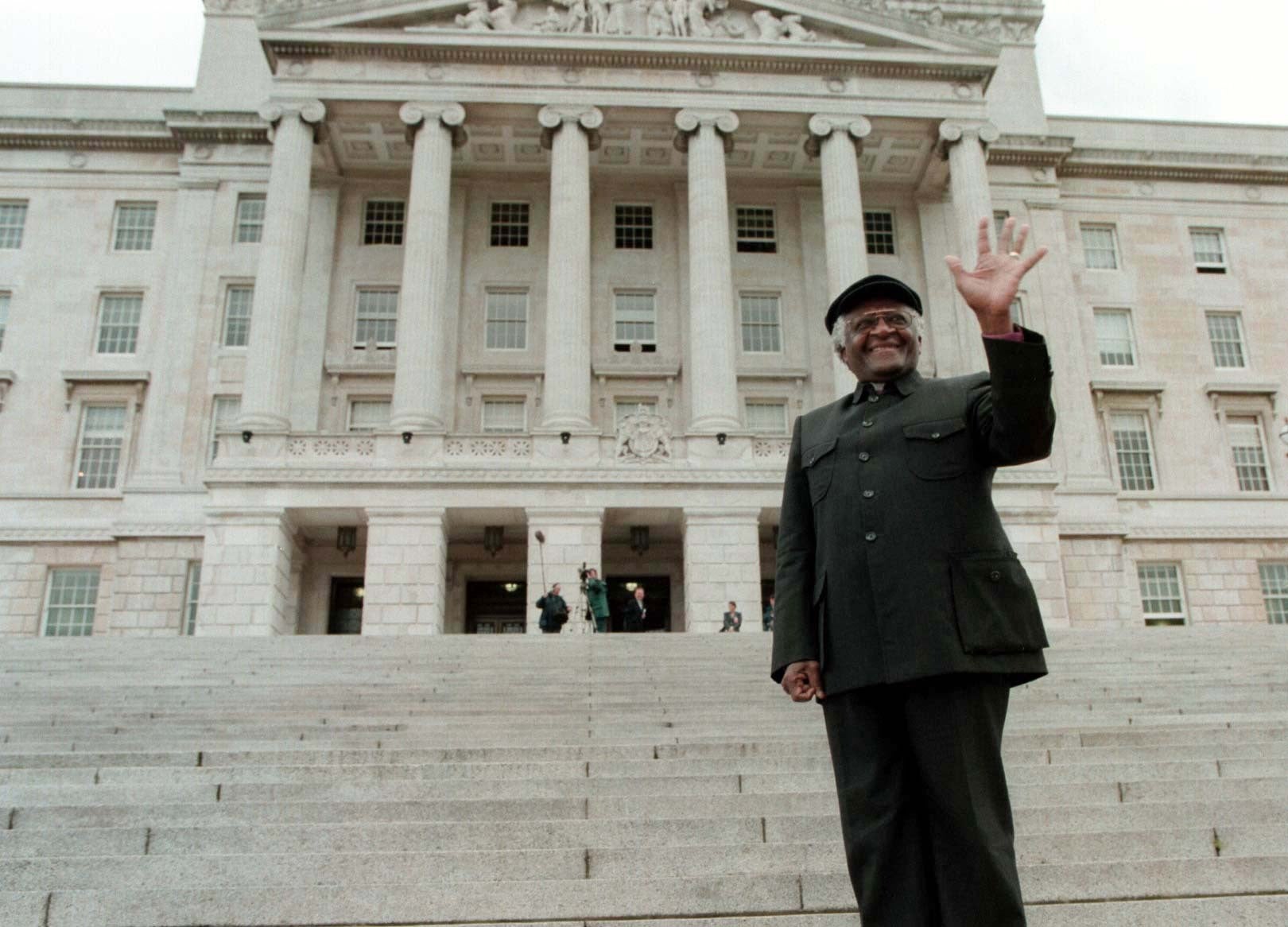 Archbishop Desmond Tutu on the steps of Stormont in 1998 (Brian Little/PA)