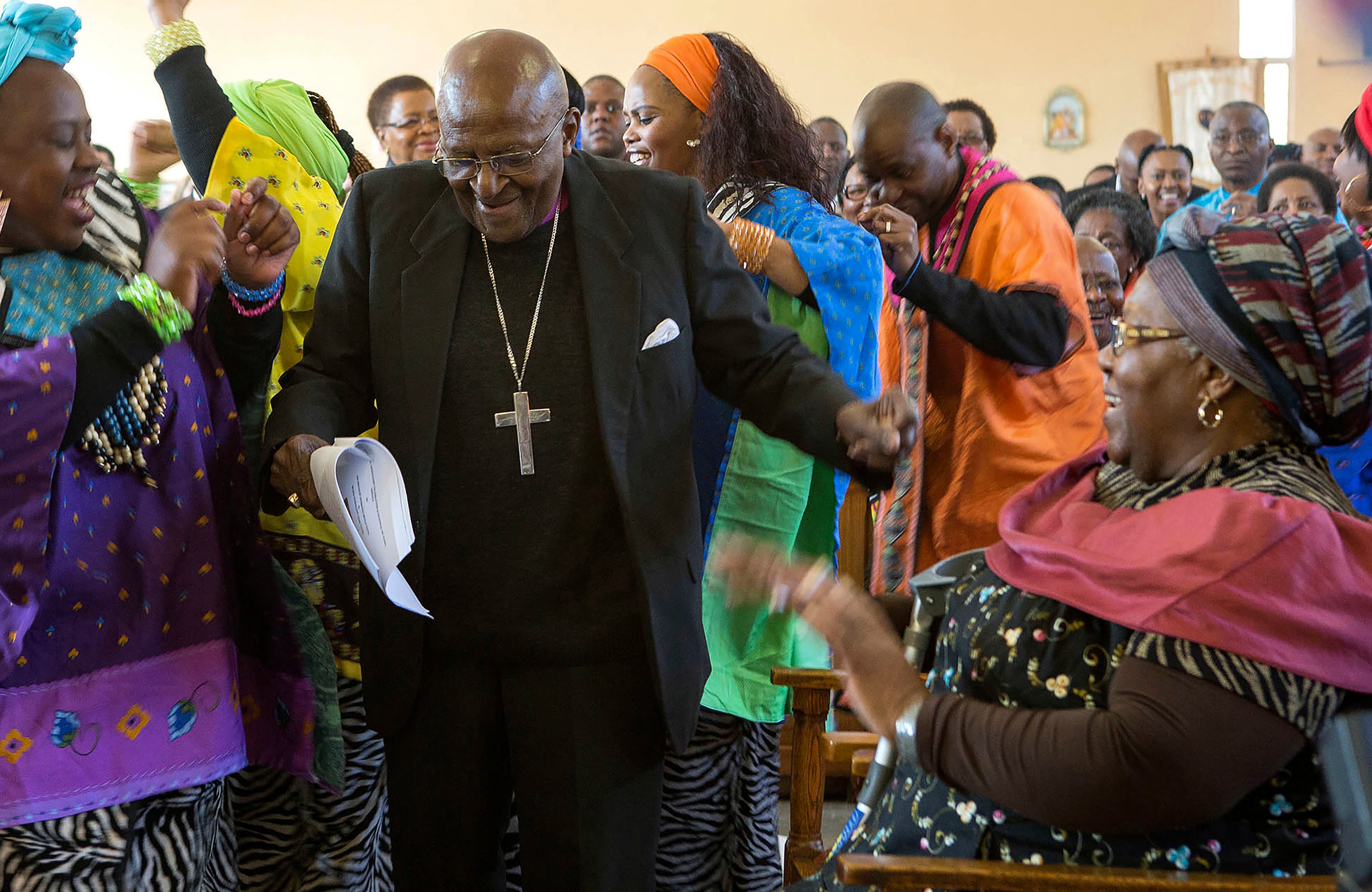 Mr Tutu dances after renewing his wedding vows to his wife of 60 years, Leah, in Johannesburg in 2015