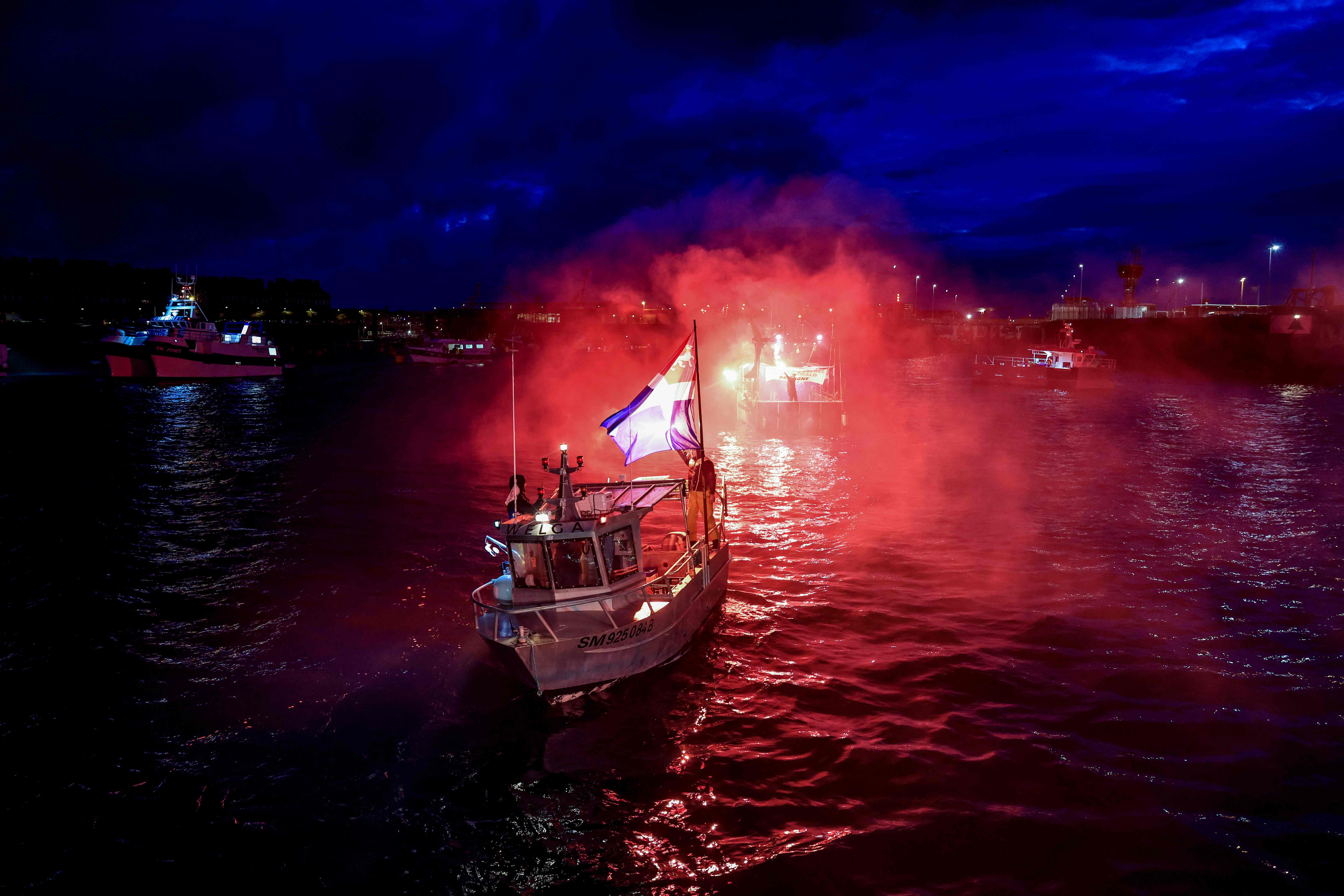 File photo: French fishing boats block the entrance to the port of Saint-Malo on 26 November 2021 in protest over post-Brexit fishing rights