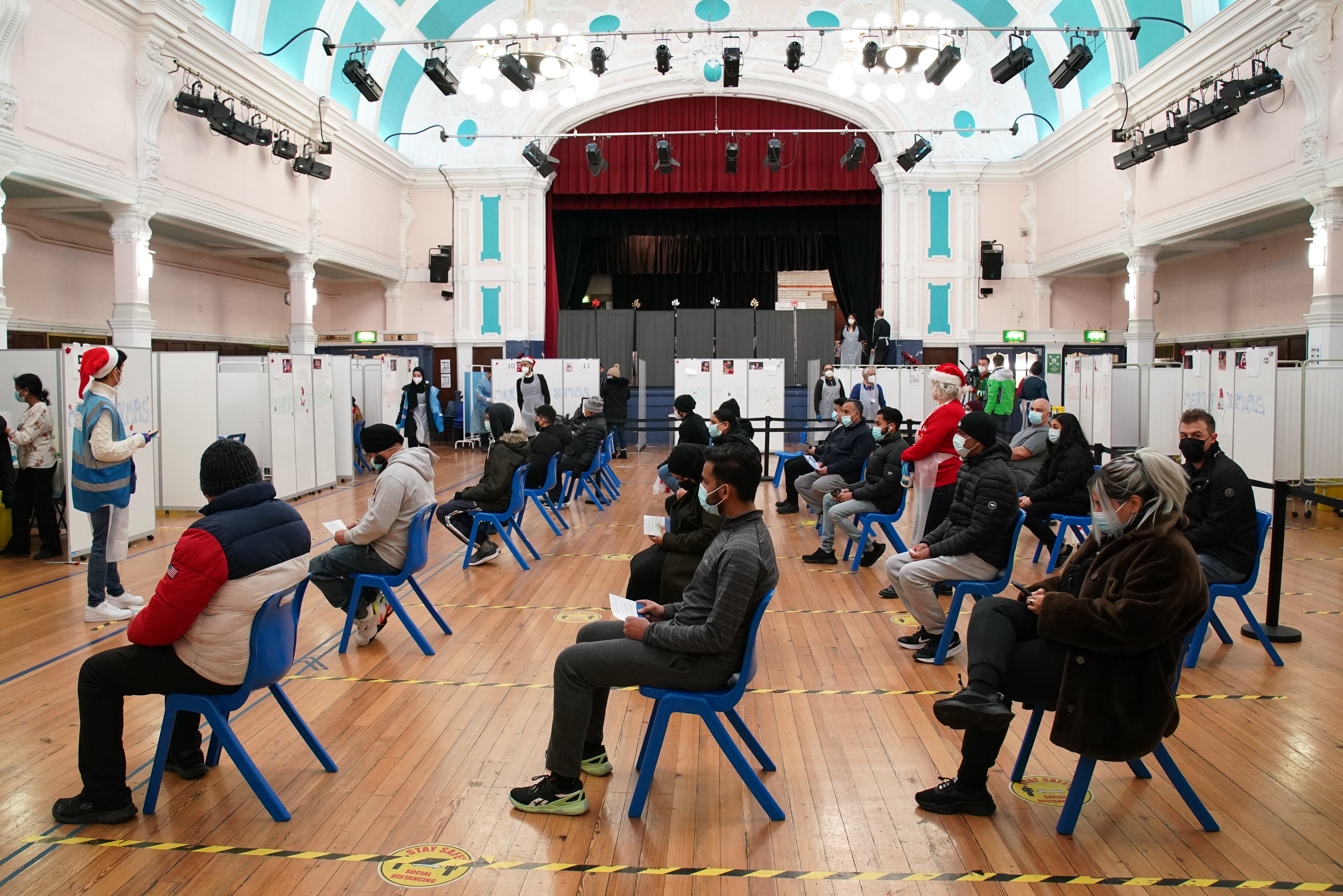 The vaccination centre at Redbridge town hall, Ilford, administered more than 900 jabs on Christmas Day (Gareth Fuller/PA)