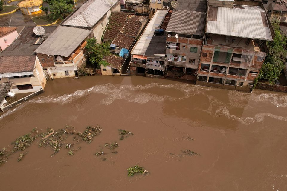 A flooded street, caused due to heavy rains, in Itajuipe, Bahia state, Brazil