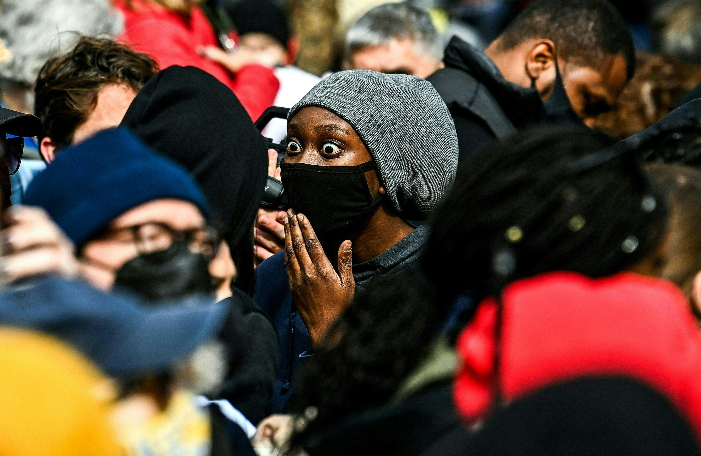 People react as the verdict is announced in the trial of former police officer Derek Chauvin outside the Hennepin County Government Center in Minneapolis, Minnesota