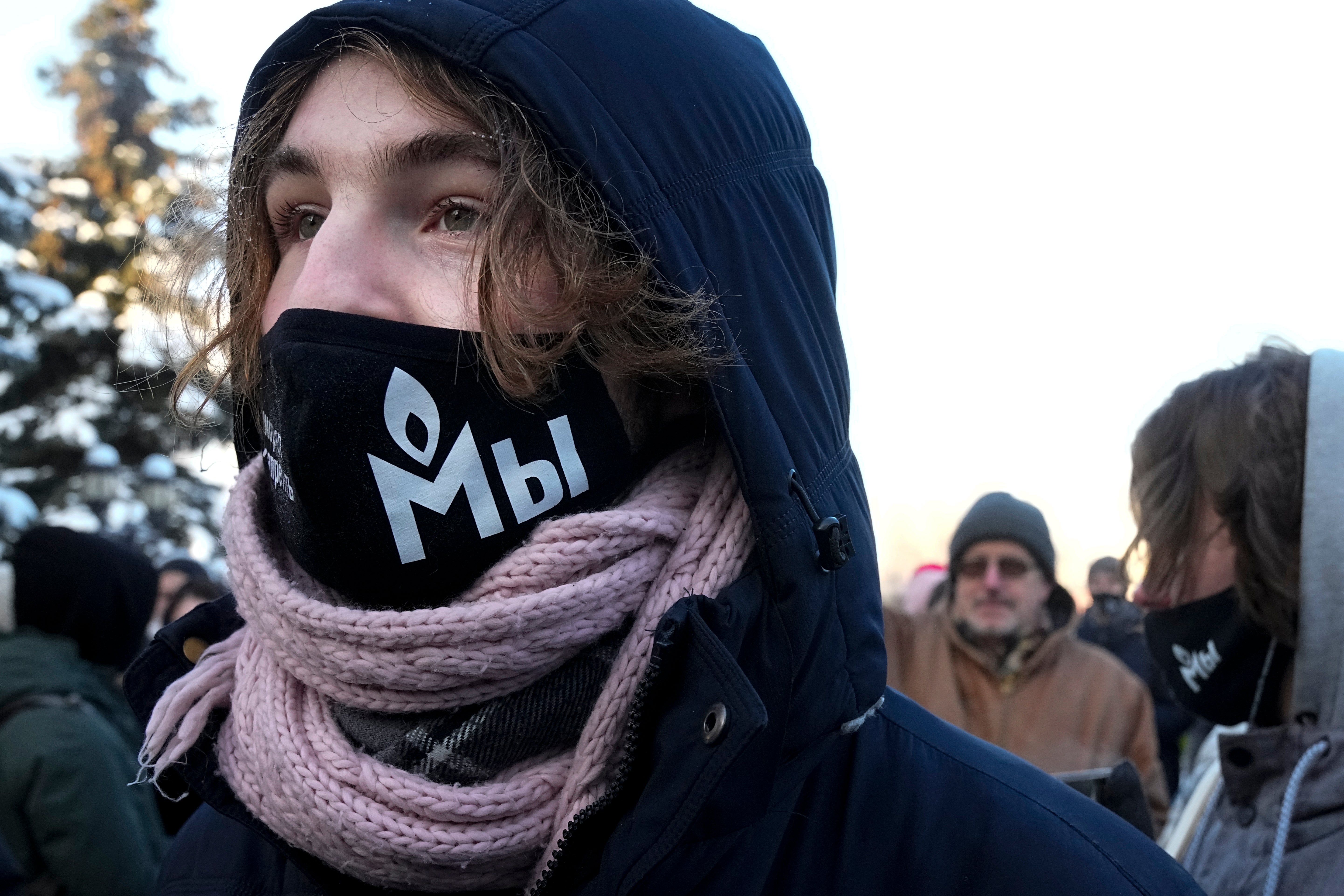 A supporter of the Memorial human rights group stands waiting for Moscow City Court’s decision (Alexander Zemlianichenko/AP/PA)