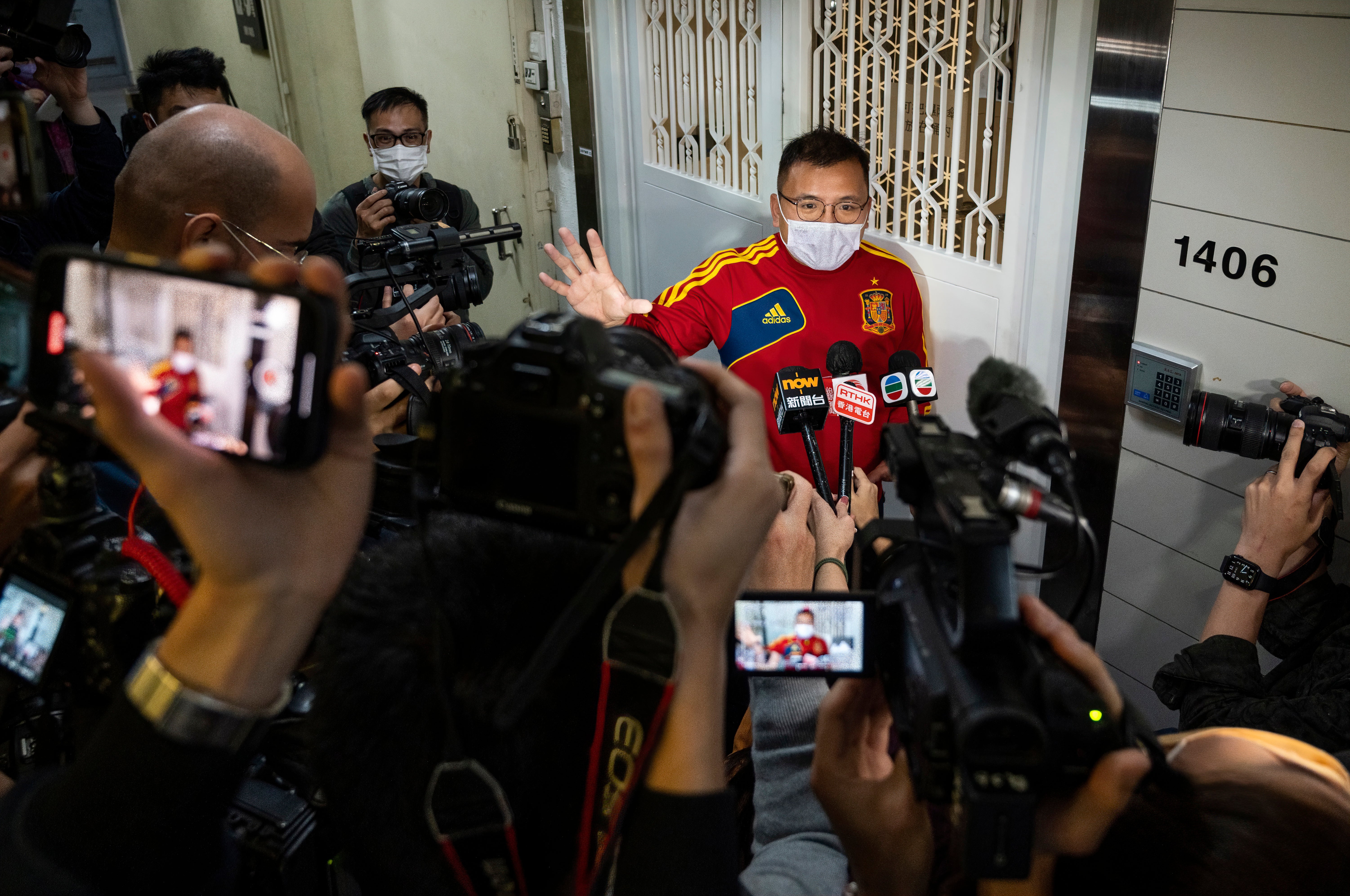 Deputy assignment editor Ronson Chan of the online media outlet Stand News speaks to members of the press