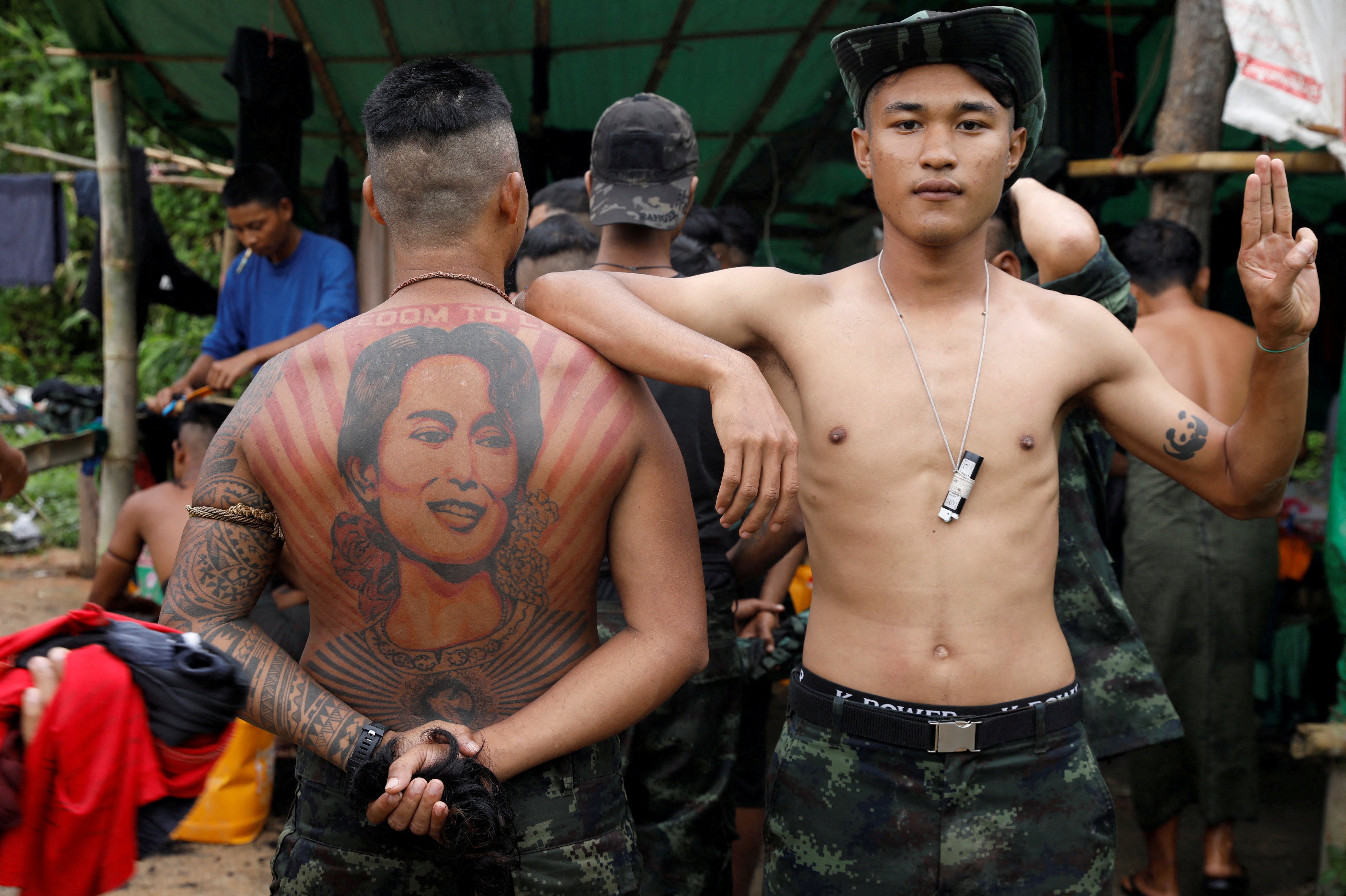 Members of the People’s Defence Force (PDF) stand at a training camp in an area controlled by ethnic Karen rebels, Karen State, Myanmar