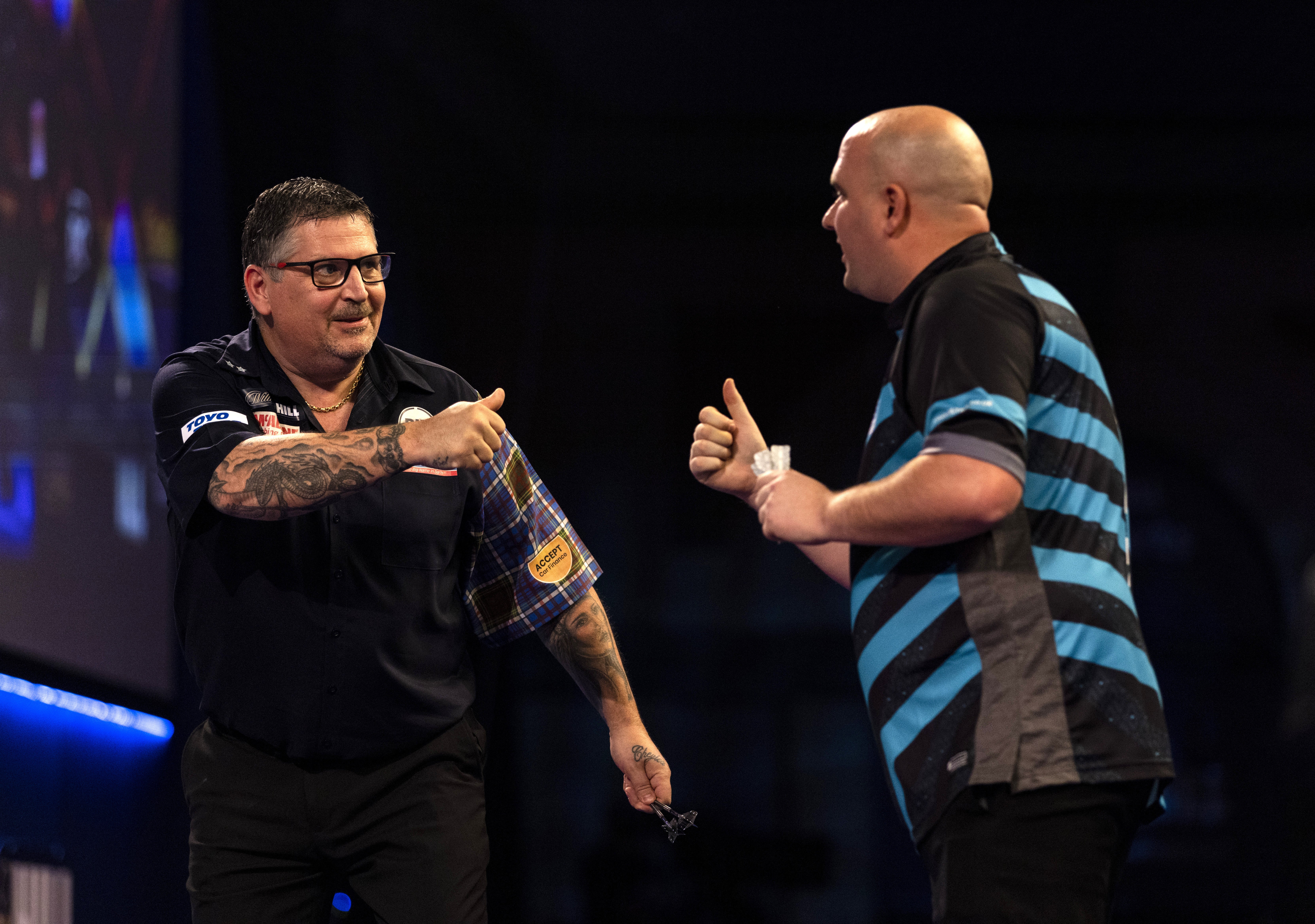 Two-time world champion Gary Anderson celebrates after his 4-3 victory over Rob Cross (Steven Paston/PA)