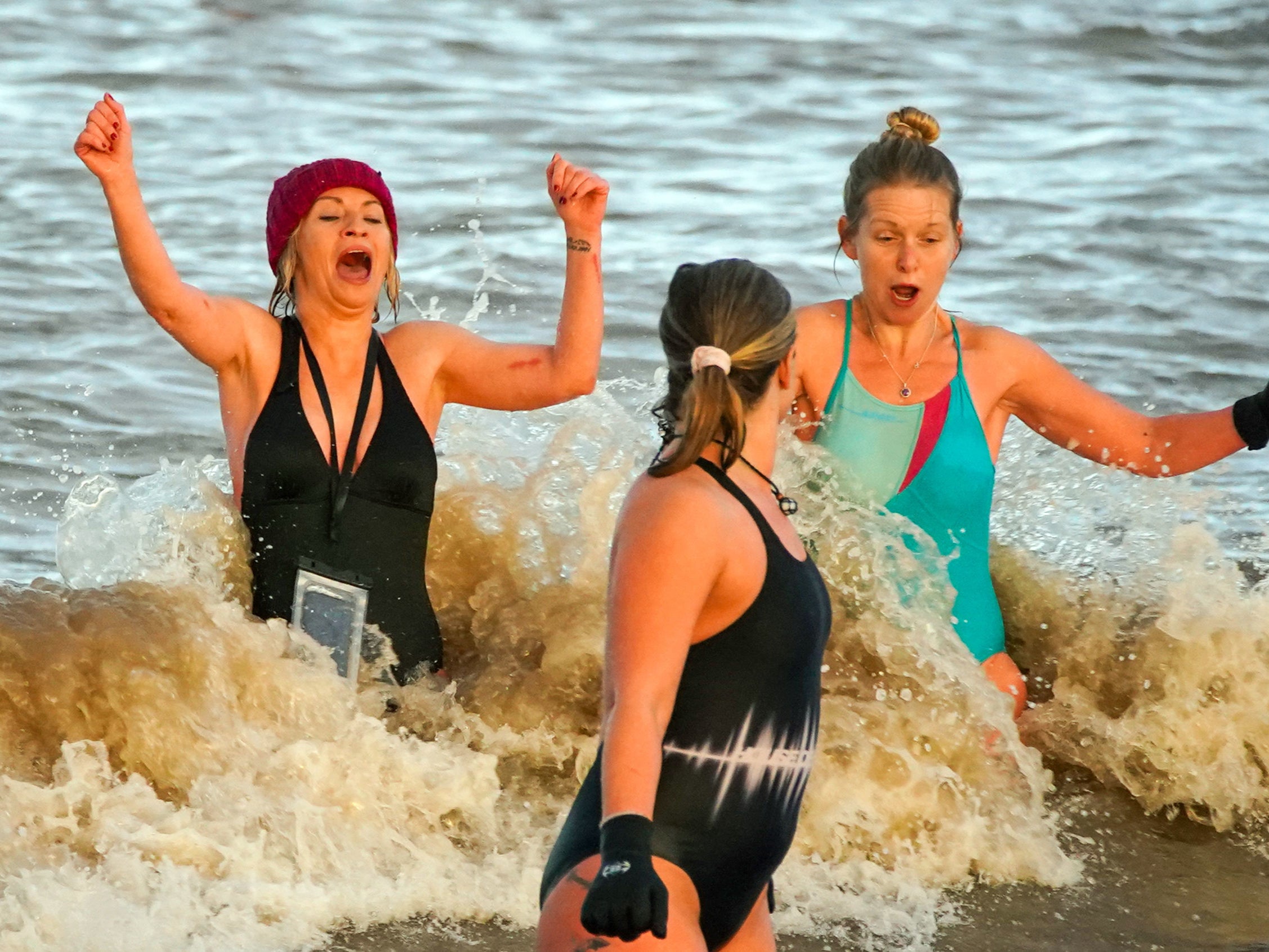 People took part in traditional New Year’s Day swims