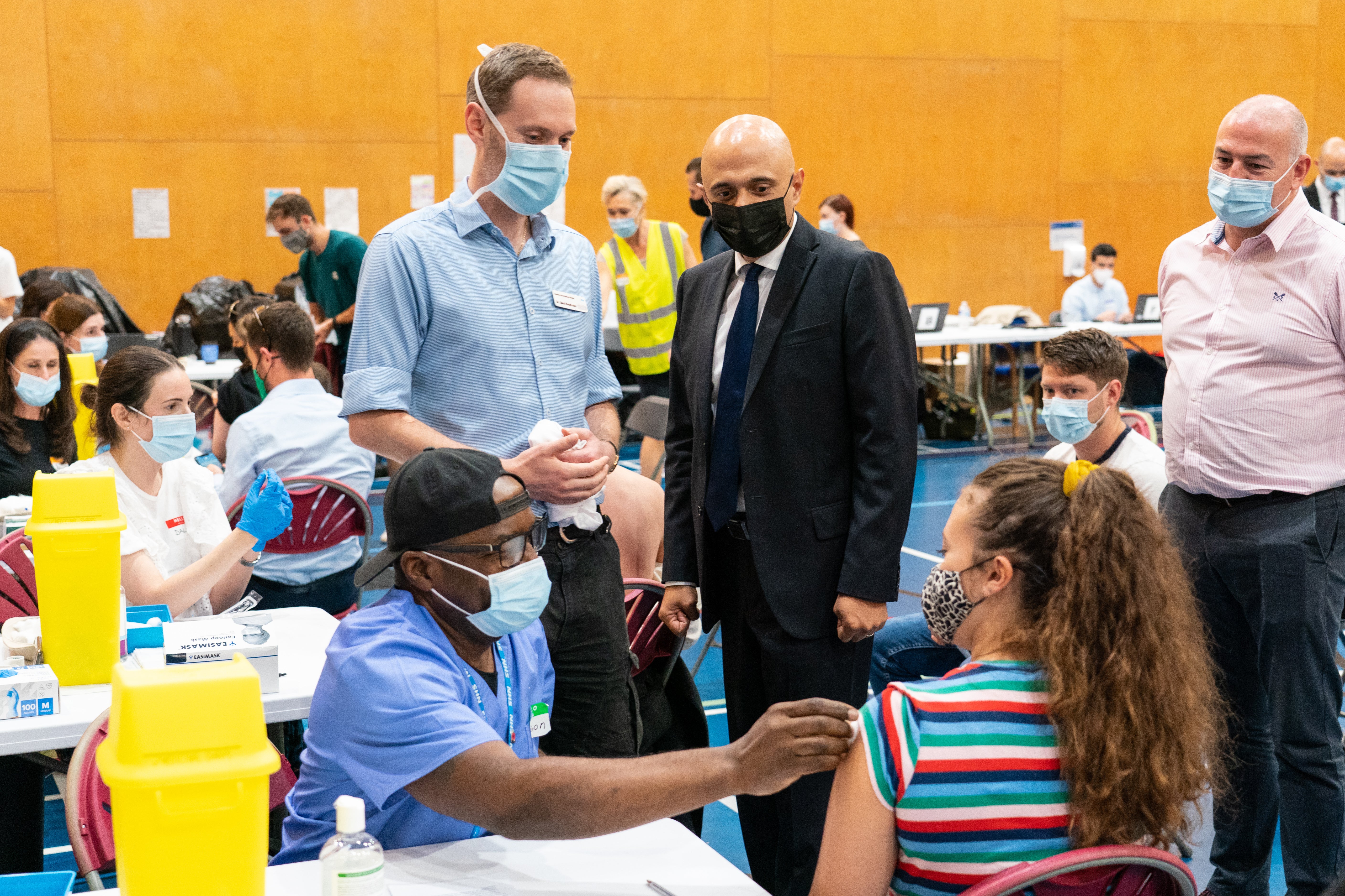 Health Secretary Sajid Javid at a vaccination centre (PA)