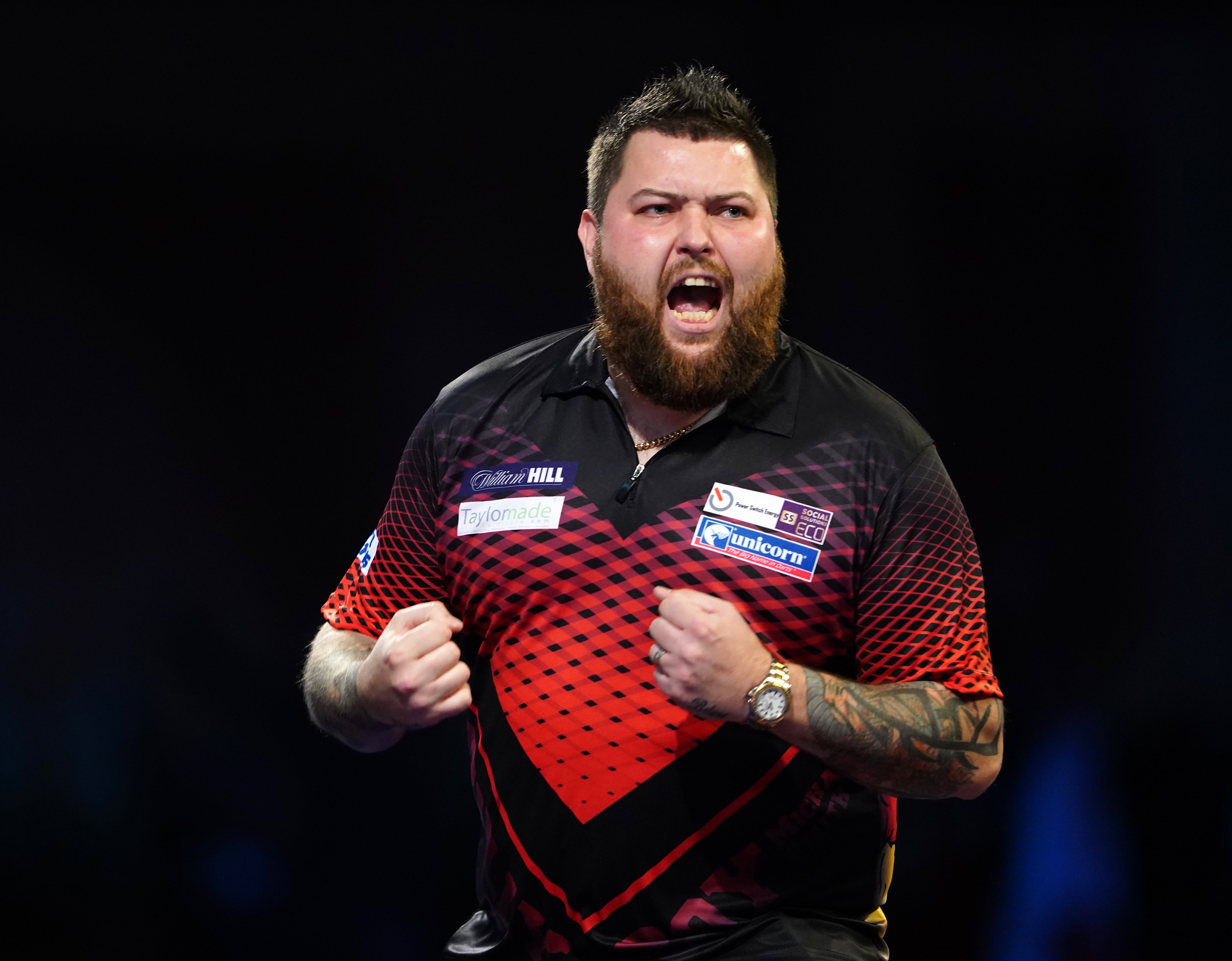 Michael Smith is through to the World Darts Championship final (Zac Goodwin/PA)