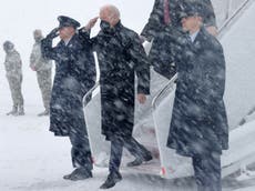 ‘He looks like a badass’: Video of Biden emerging from snowed in Air Force One goes viral