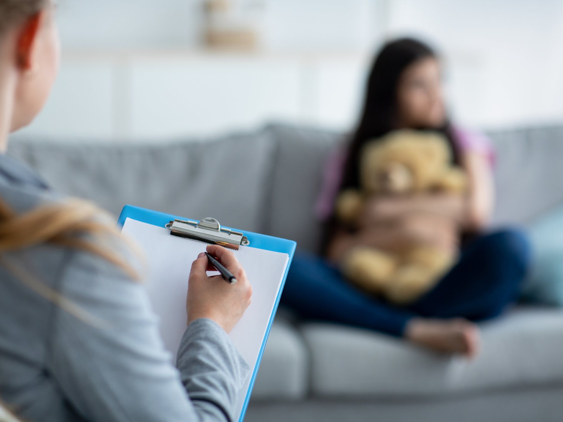 A teenager speaks to a doctor