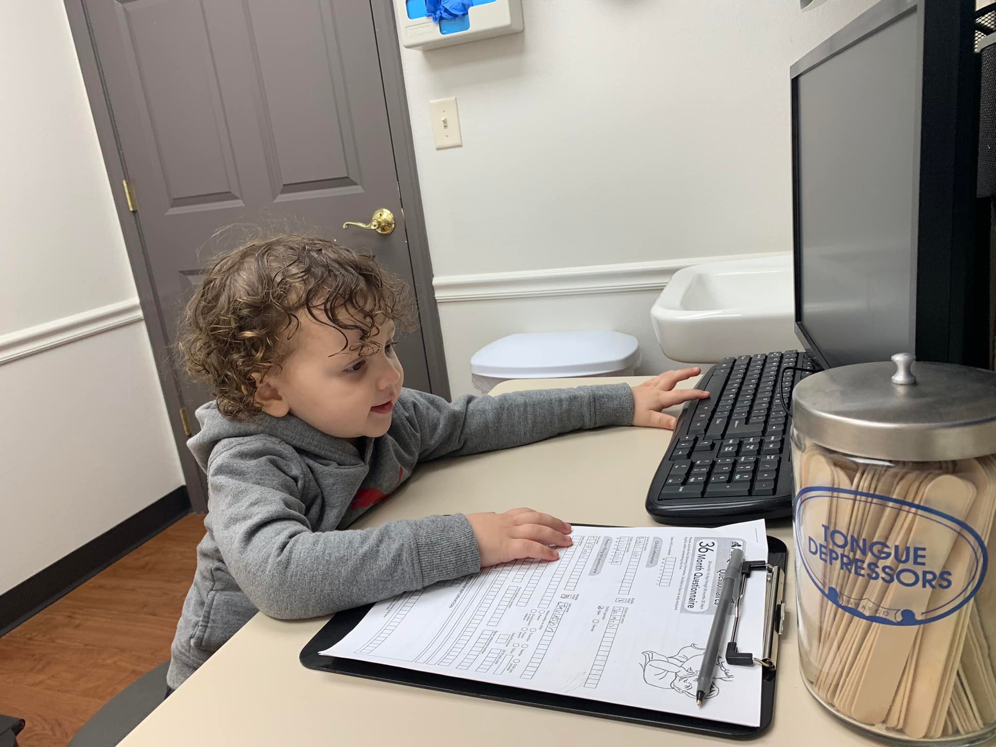 Adrian James at a recent doctor’s appointment. His mother, Tiffany Jackson, says he likes to pretend he’s the doctor