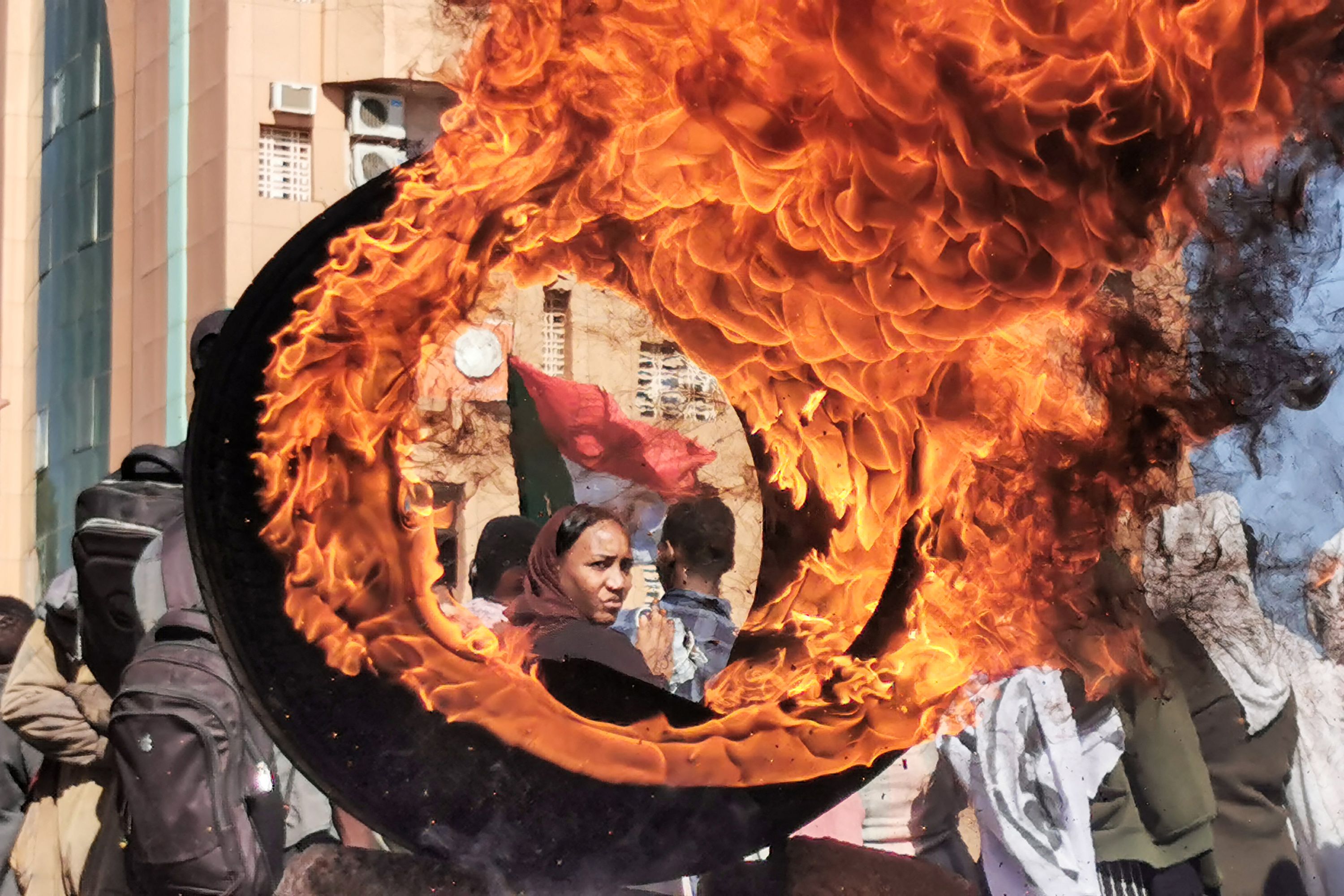 A demonstrator during a protest demanding civilian rule in the Sudanese capital's twin city of Omdurman on 4 January 2022