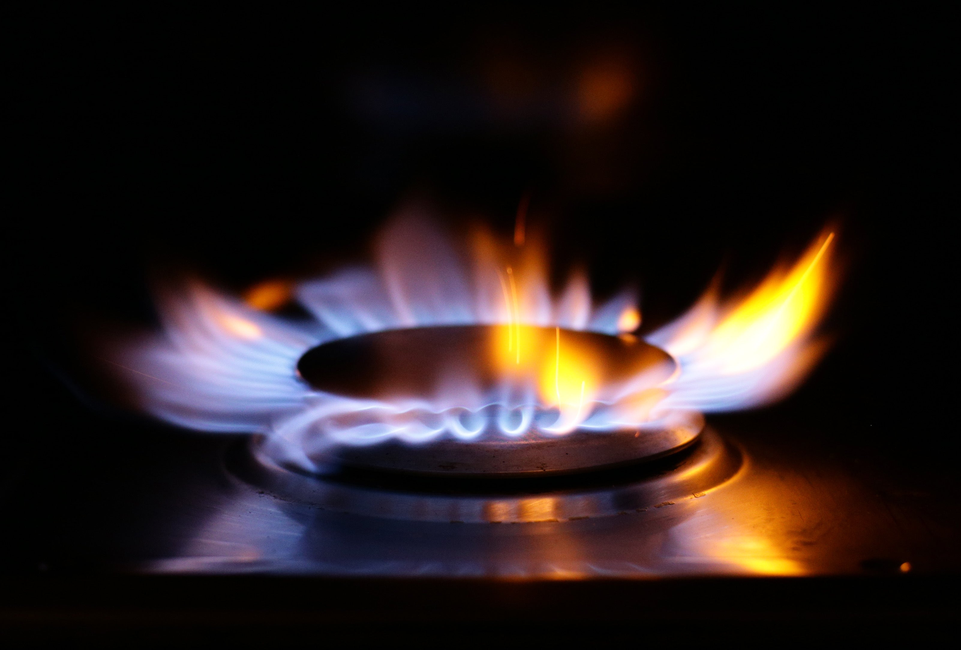 A lit ring on a gas hob at a home in north London (Yui Mok/PA)