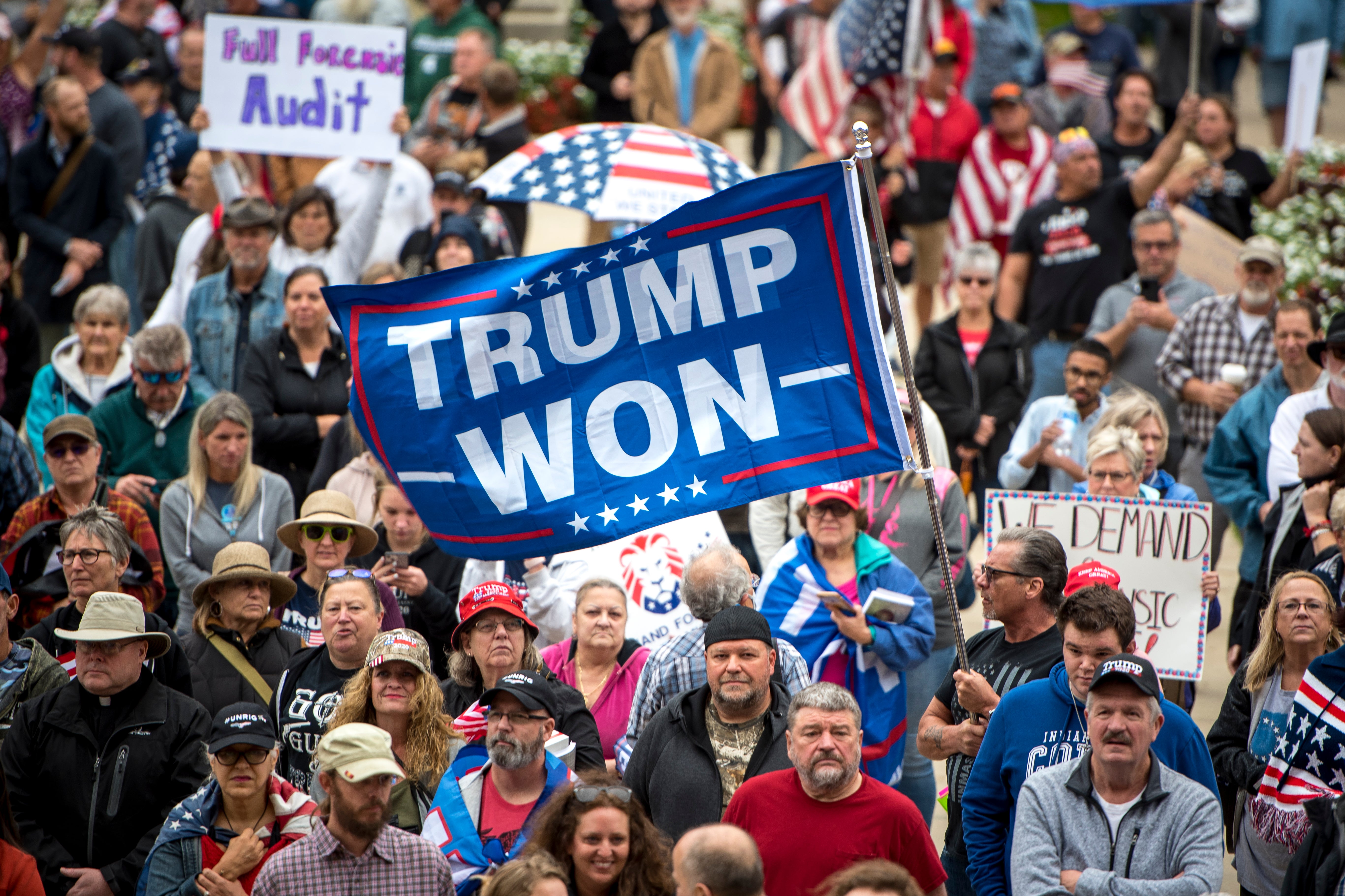 Protests against Trump’s 2020 defeat have continued, such as in Lansing, Michigan on 12 October, nearly a year after the election